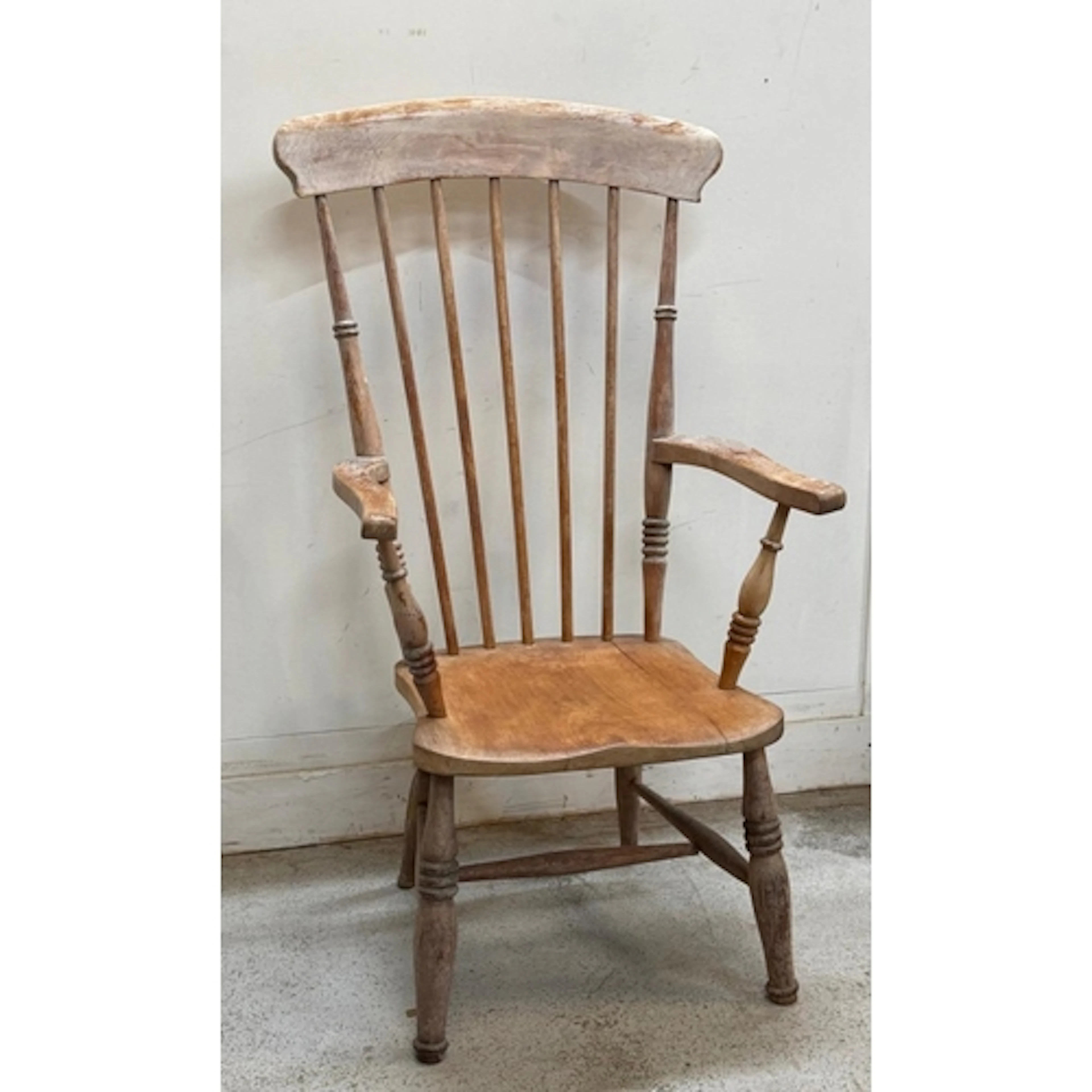 A pine stick back Windsor chair