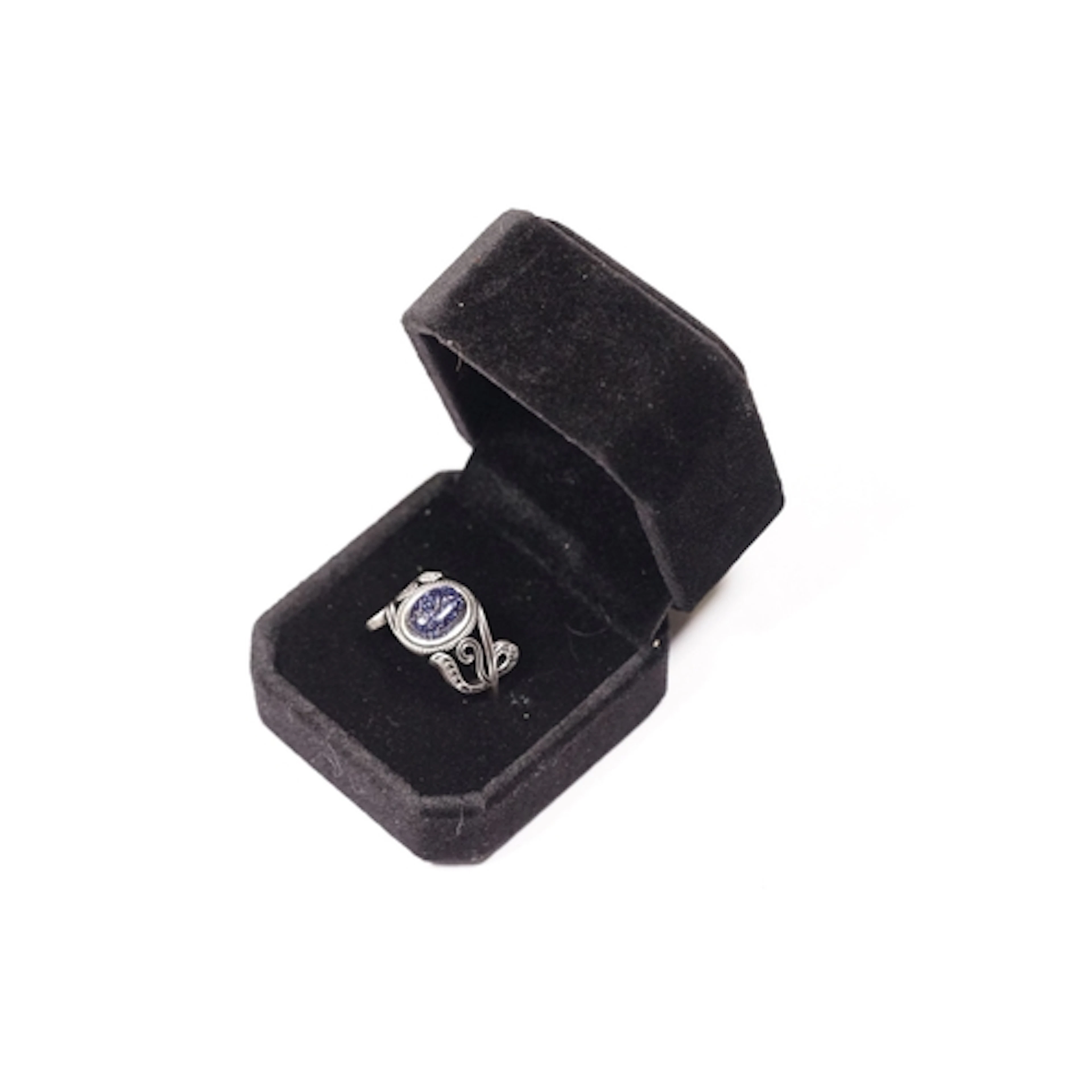 A ladies silver ring set with large oval Blue Sandstone cabo...