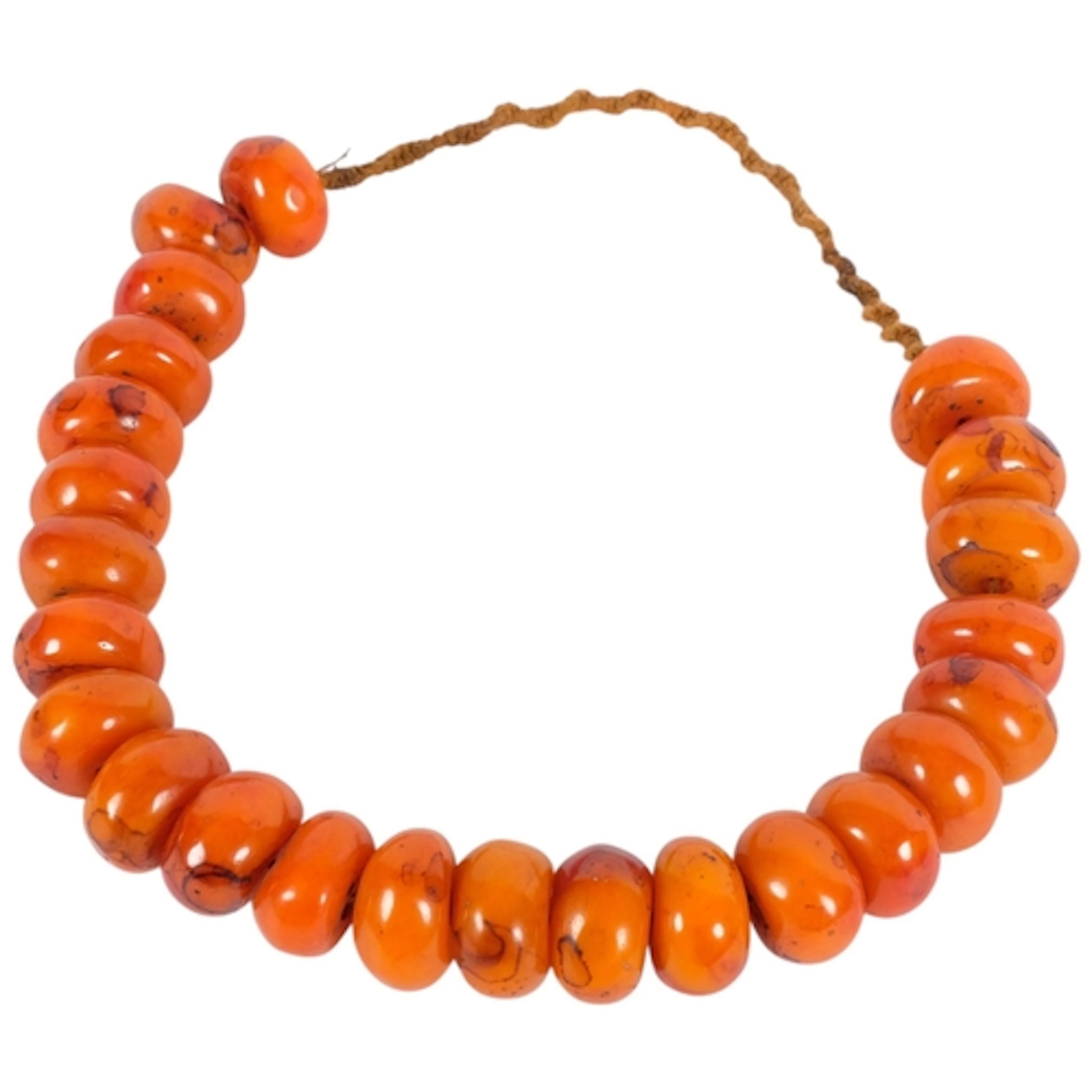 An Antique Tibetan amber bead necklace, bead diameter approx...