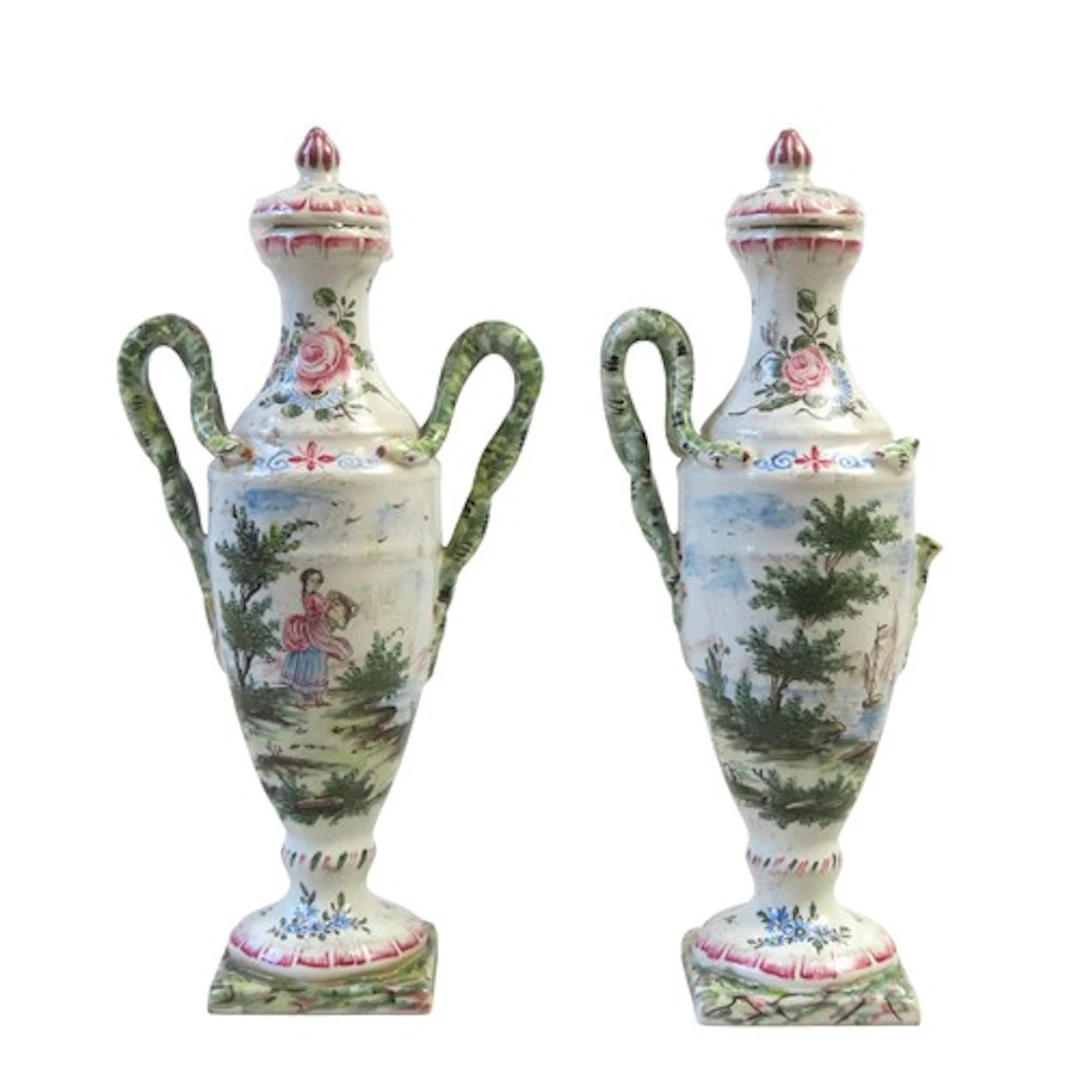 A PAIR OF VEUVE PERRIN FAIENCE COVERED VASES MID 18TH CENTUR...