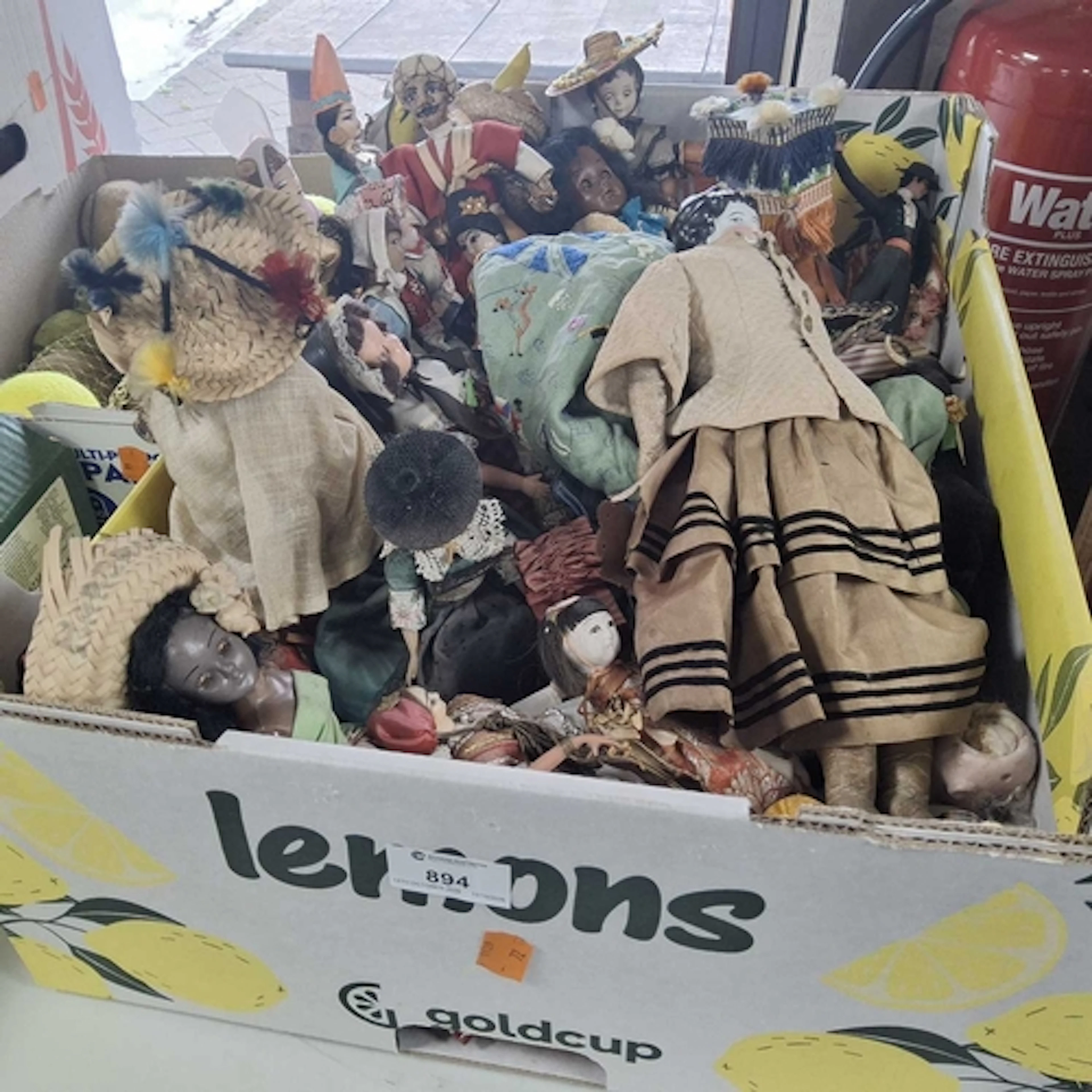 ONE BOX OF COLLECTABLE DOLLS comprising approximately thirty...