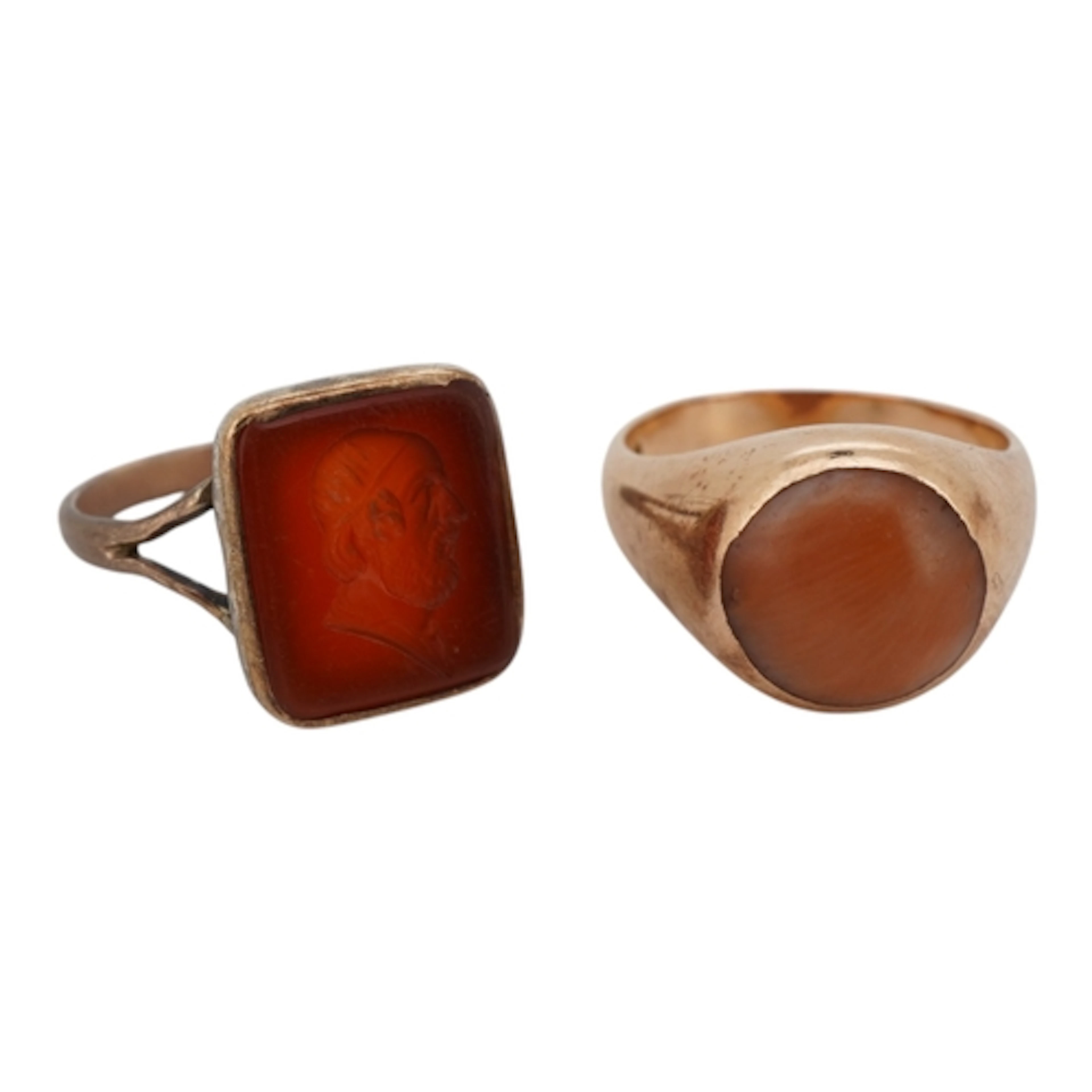 A carnelian intaglio ring and a coral signet ring, comprisin...