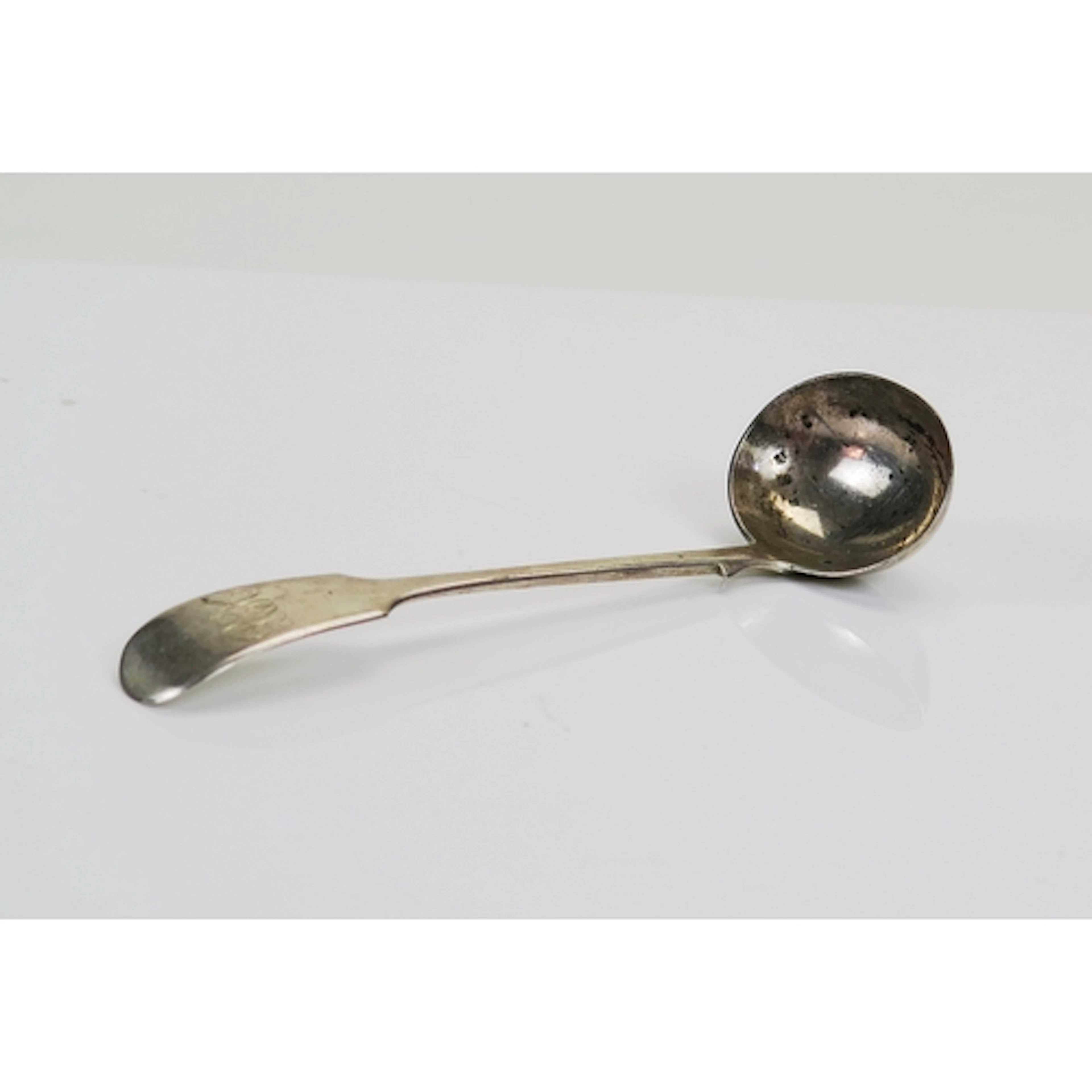 A Victorian silver sauce ladle, maker Thomas Hart Stone, Exe...