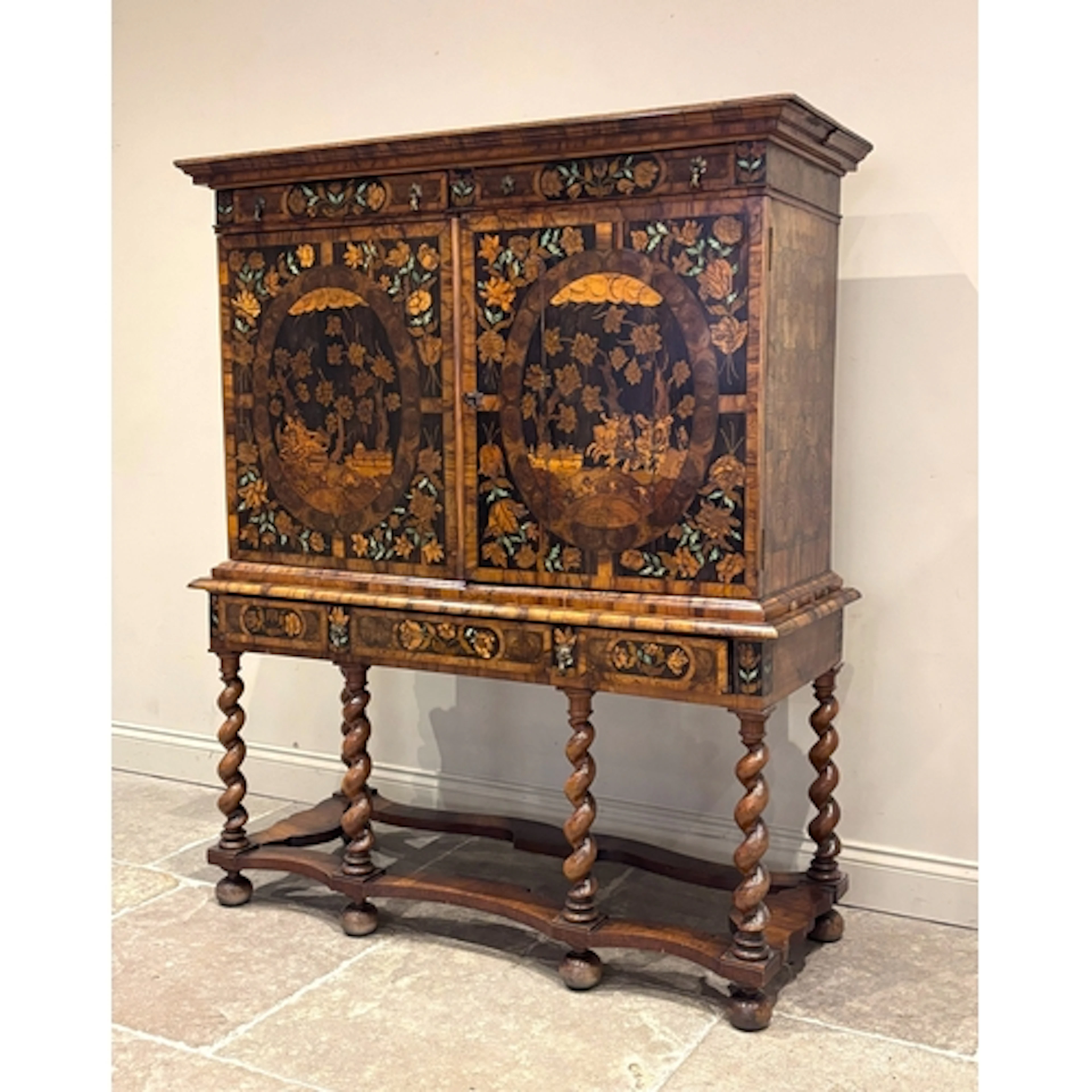 A large and impressive William & Mary walnut and oyster vene...