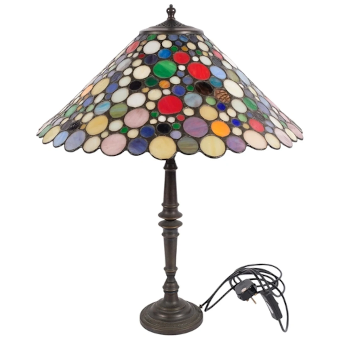 A Tiffany style turned brass table lamp, with multi-colour l...