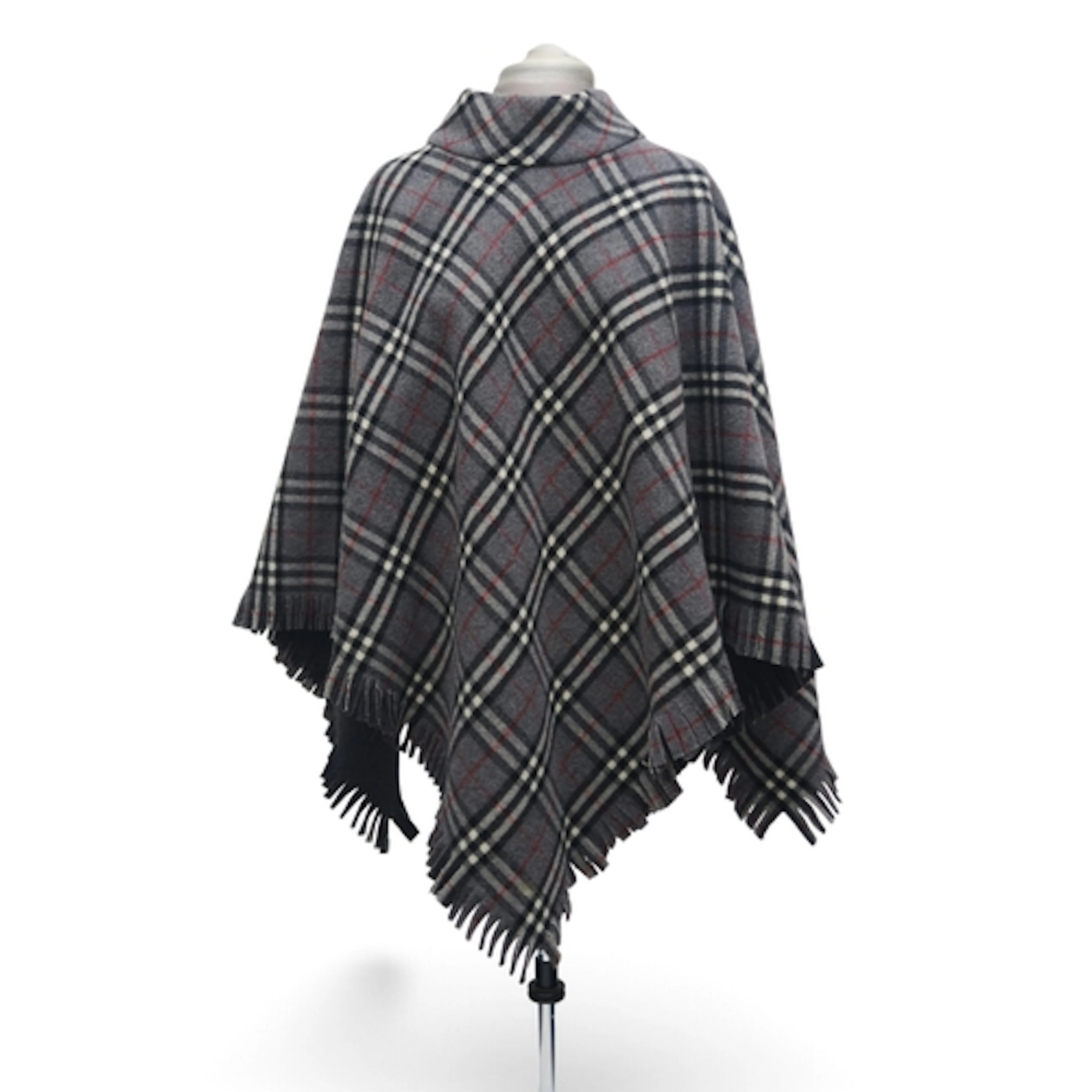 A Burberry wool poncho in grey check with charcoal grey back...