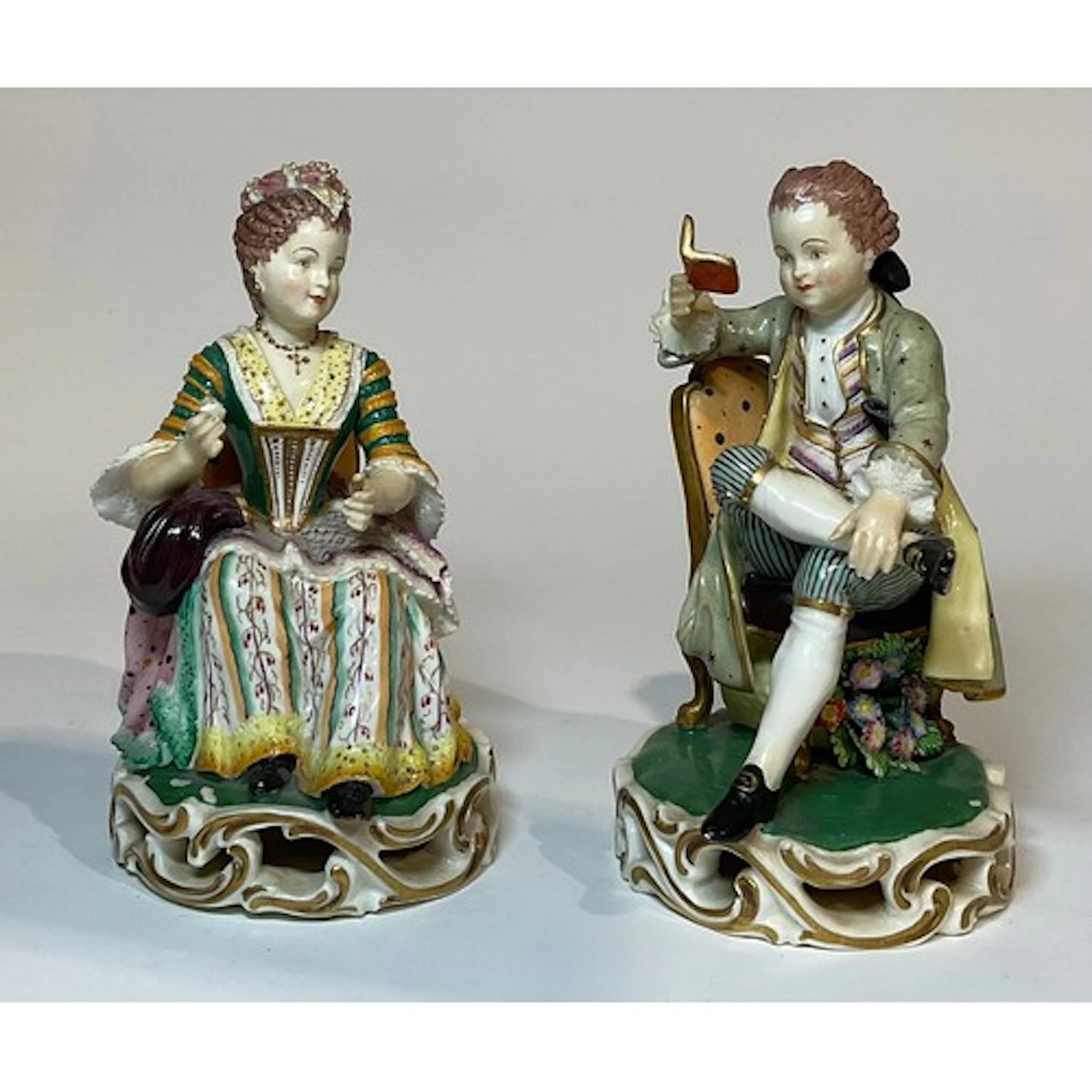 A pair of Bloor Derby figures, Boy Reading a Book and Girl T...