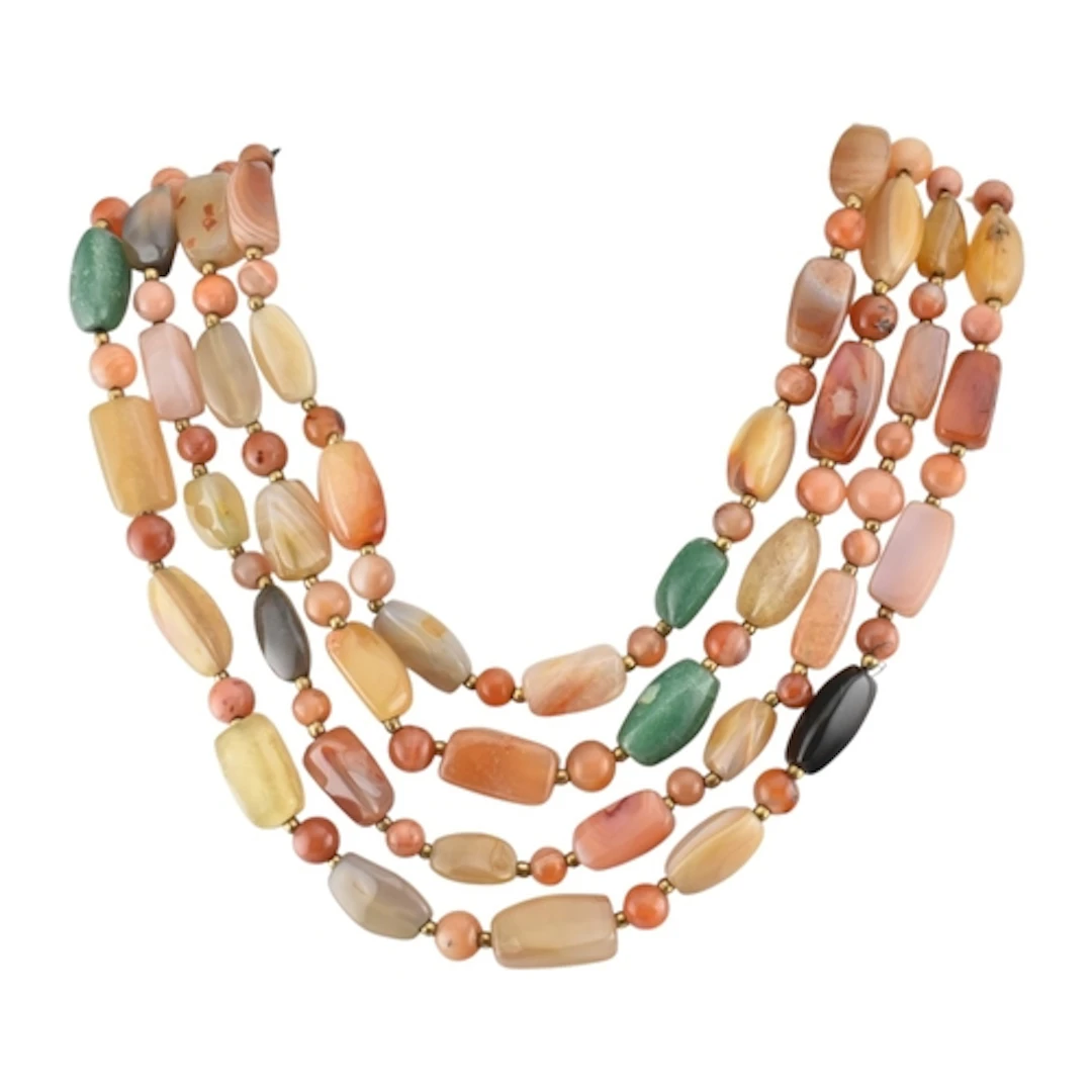 A long aventurine quartz, agate, and jasper necklace of matc...
