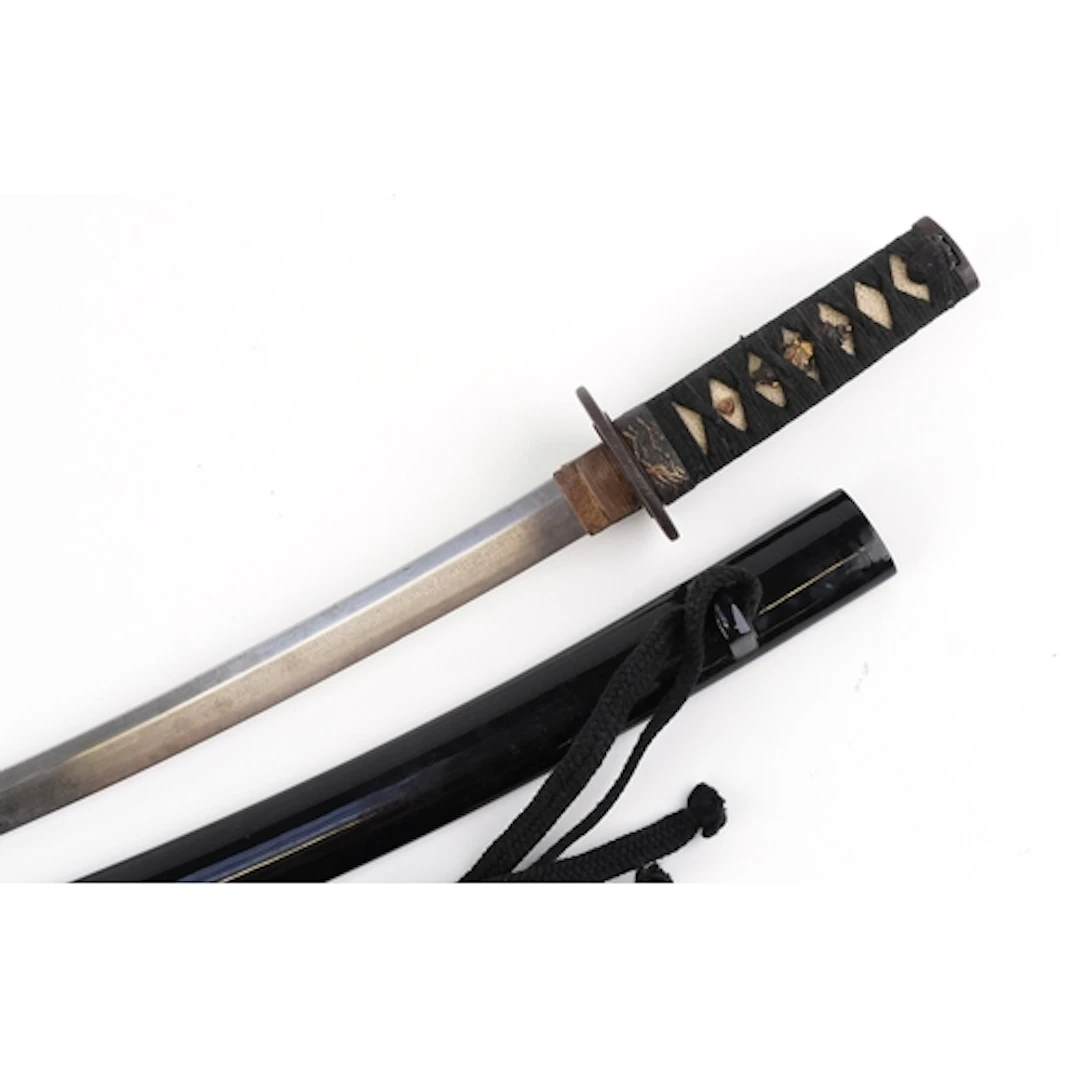 Vintage Japanese short wakizashi sword having cloth bound sh...