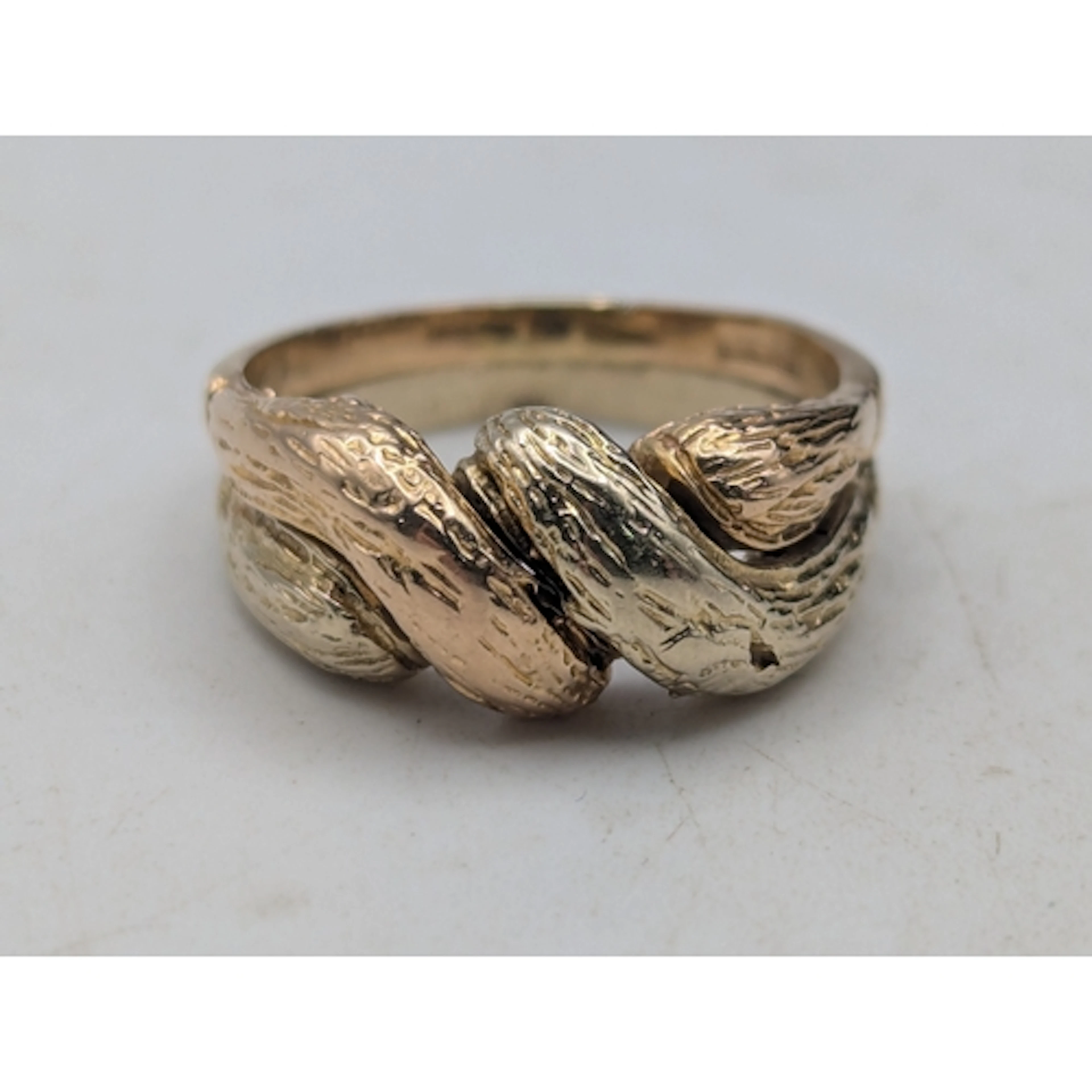 An Egyptian gold ring, tested as 14ct gold, fashioned as two...