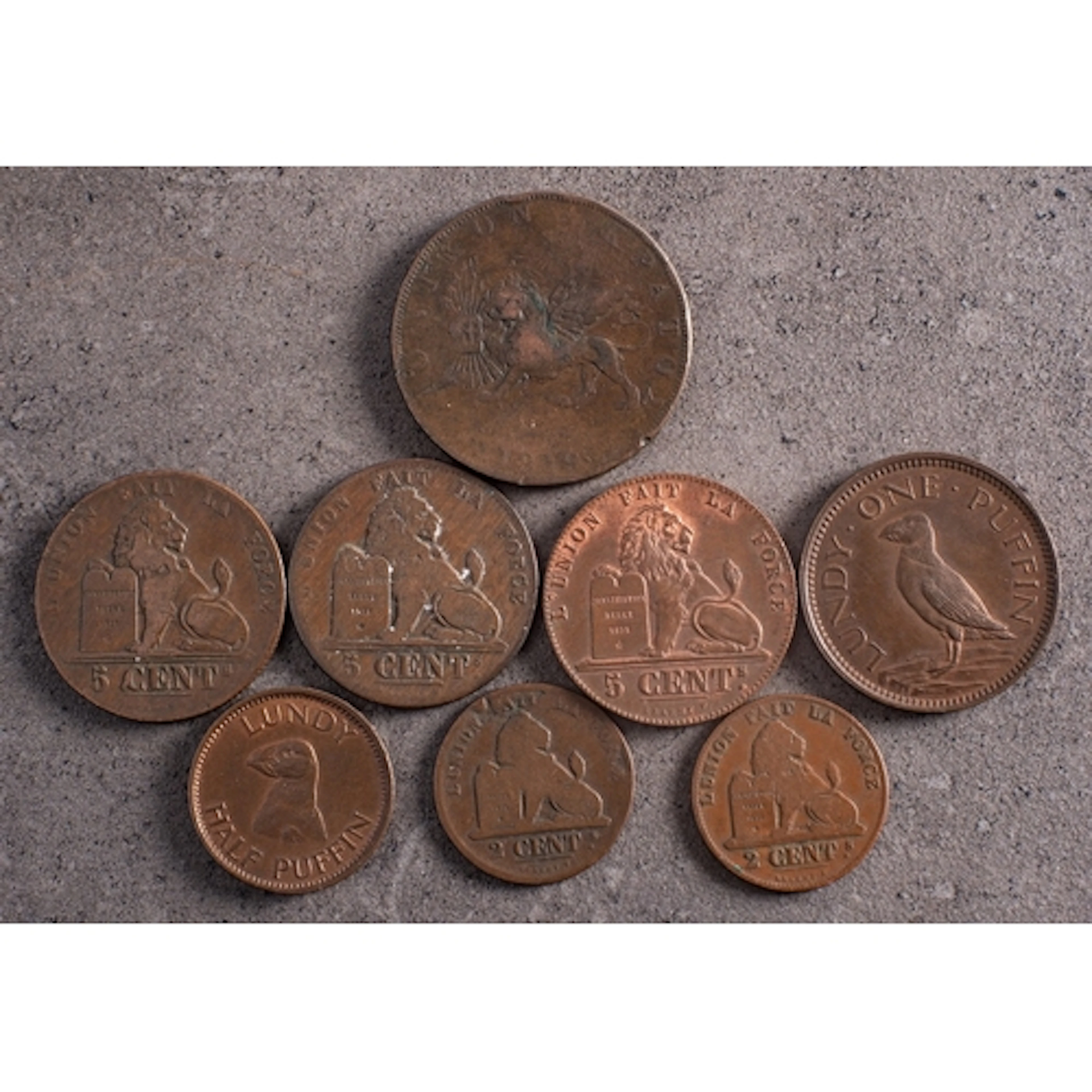 An 1851 Belgium 5 cent coin of higher grade. Together with a...