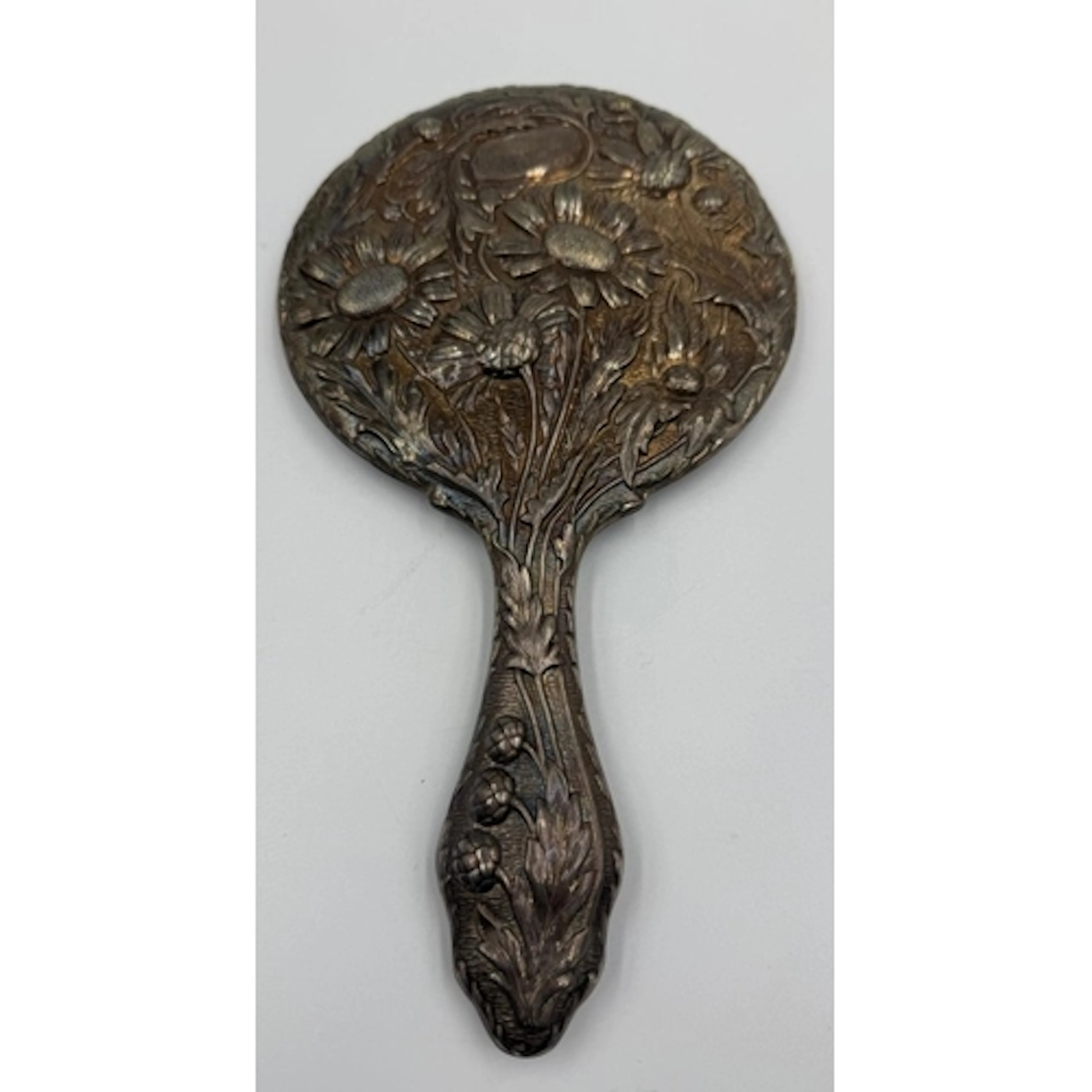 An art nouveau silver hand mirror frame hallmarked for Birmi...