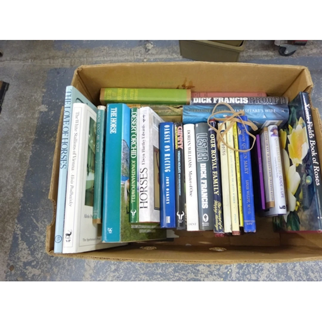 Three boxes of vintage books.