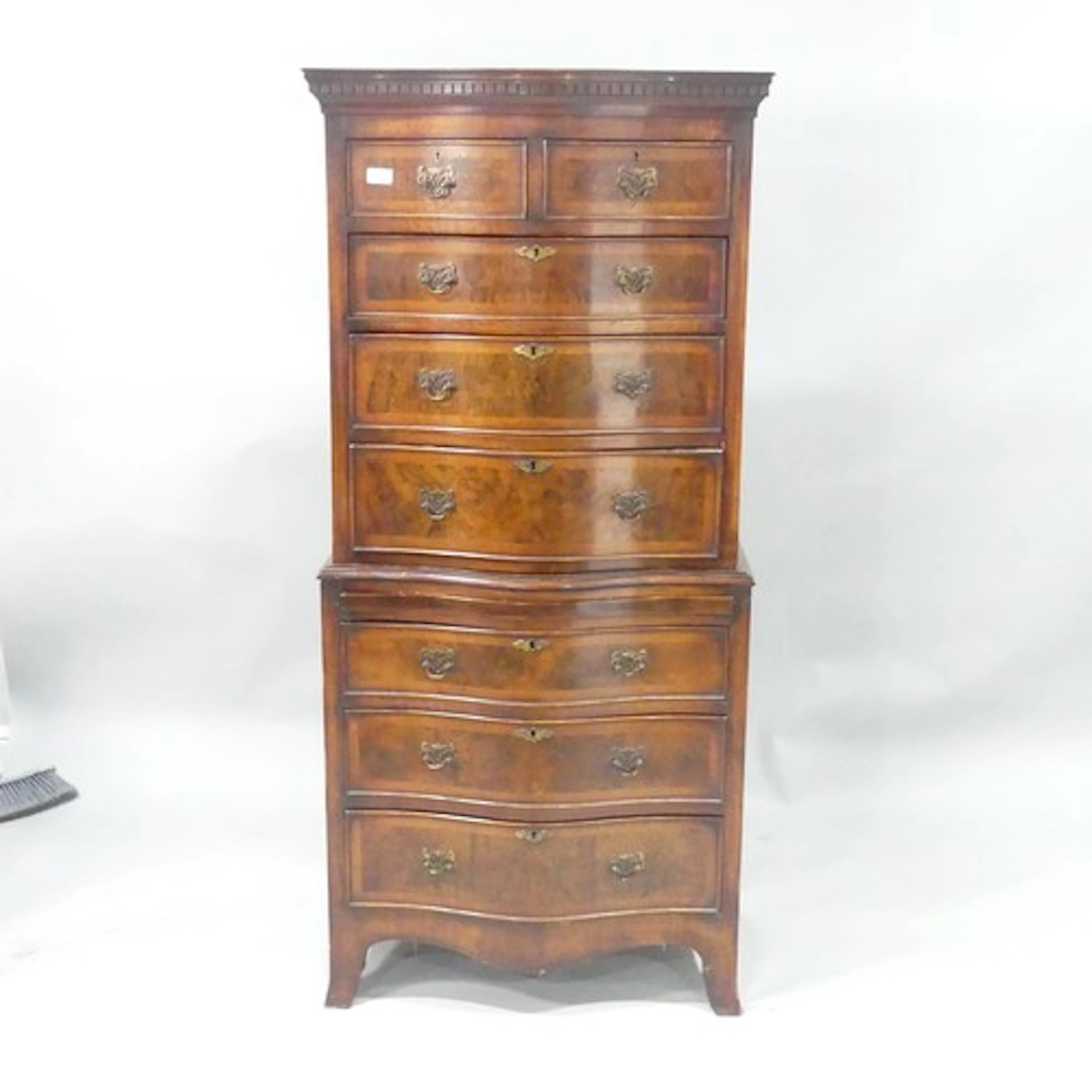 Mid-20th century Georgian style walnut serpentine chest on c...