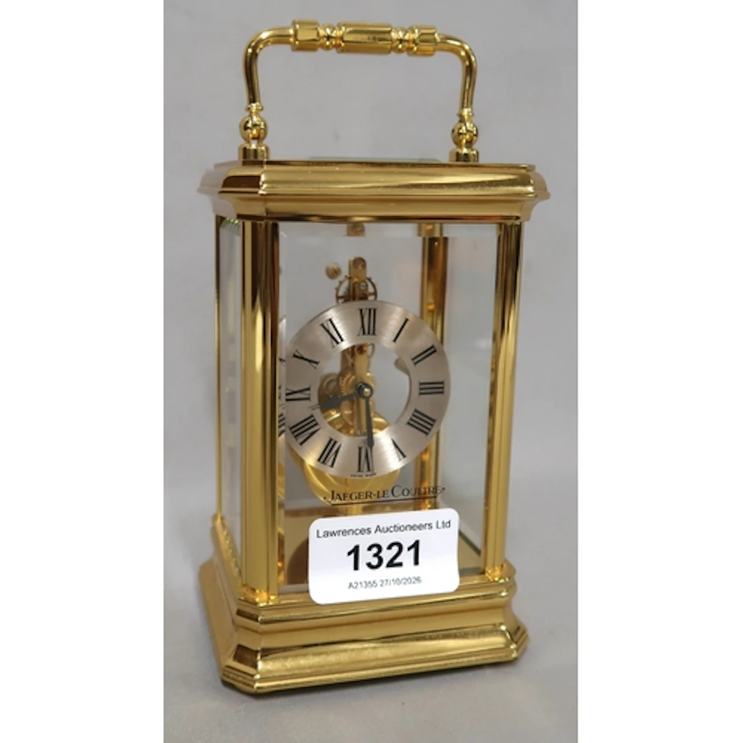 Jaeger-Le-Coultre gilt brass carriage clock, the silvered di...
