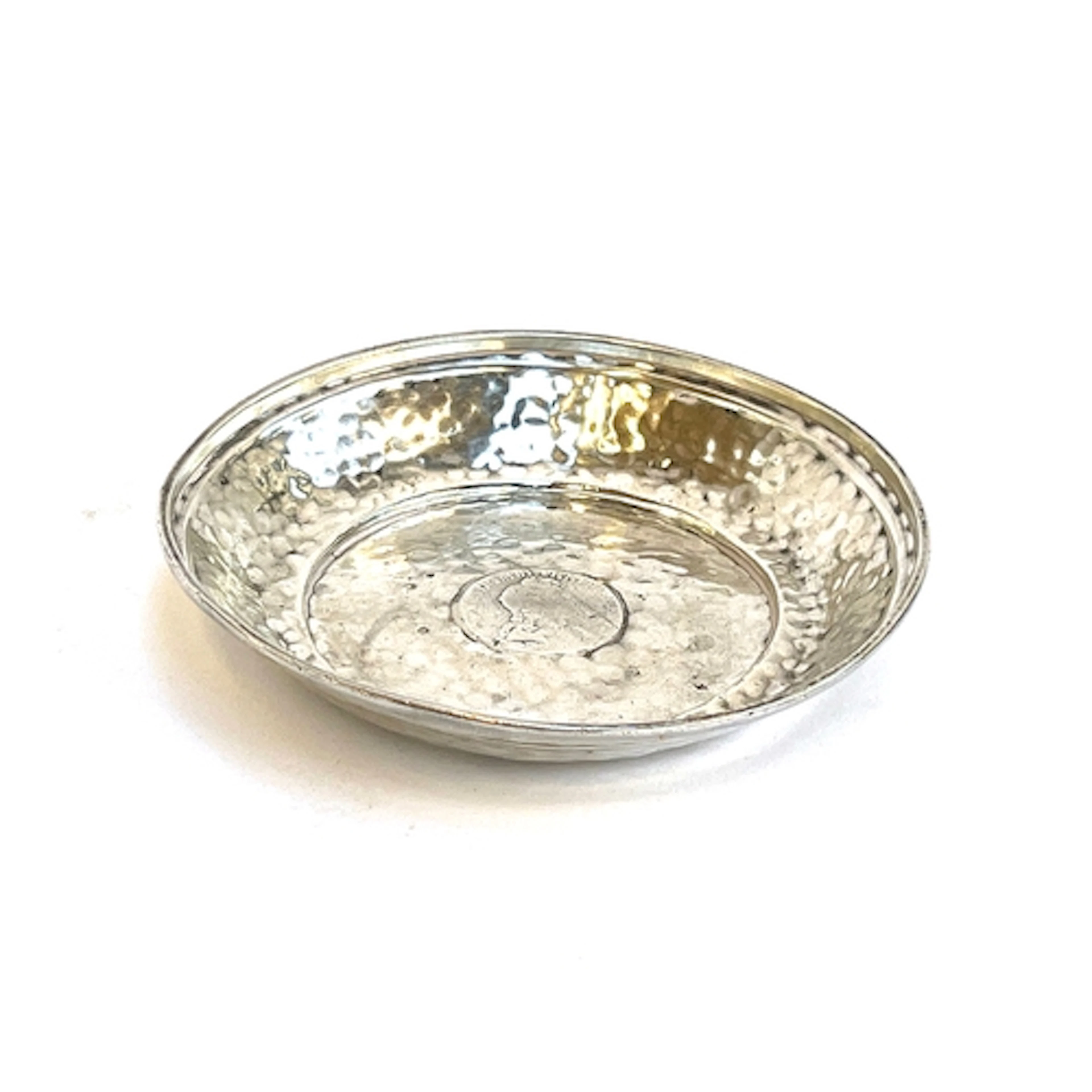 A hammered silver pin dish by Charles Edwards, London 1912, ...