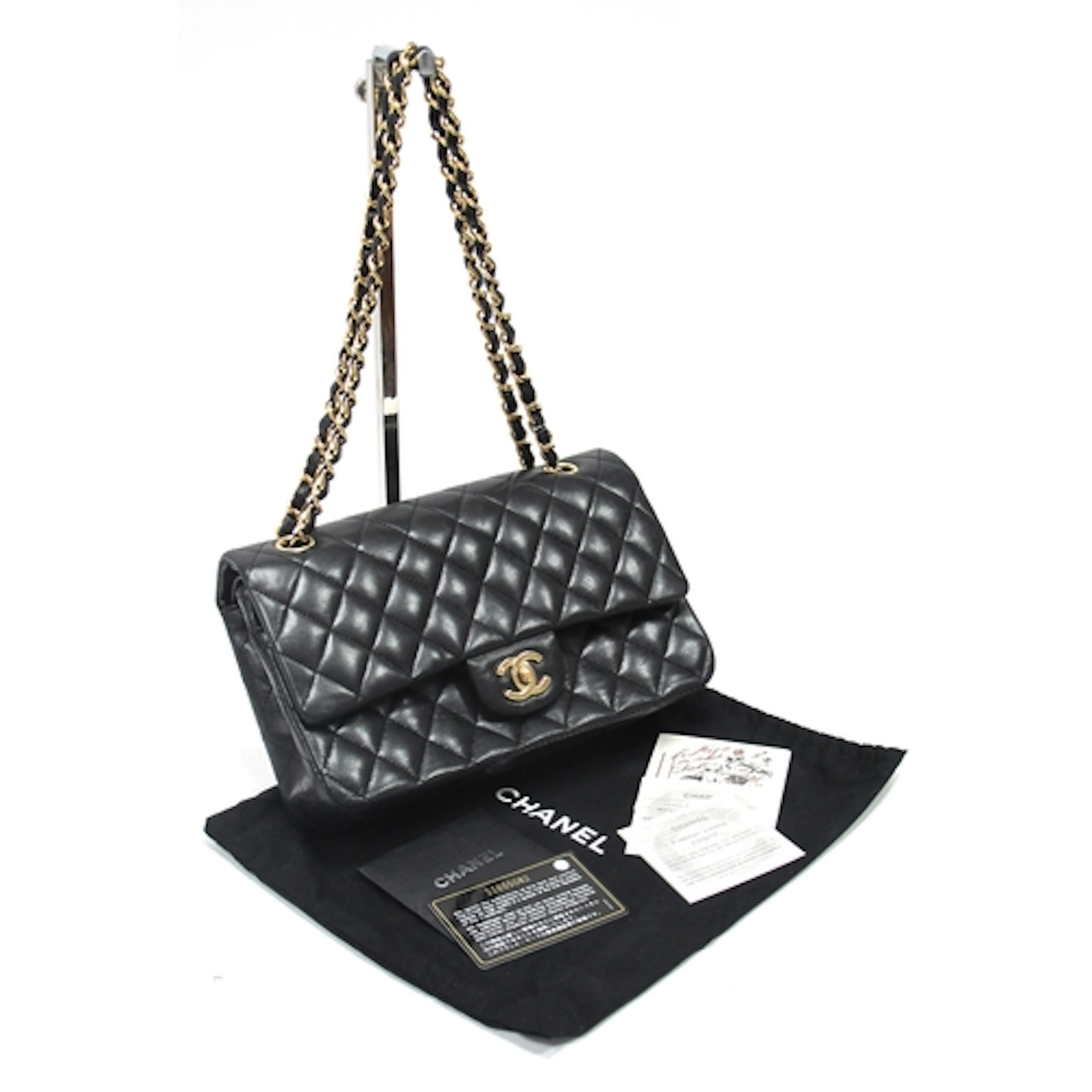 CHANEL; A Medium Classic Double Flap Handbag, quilted black ...