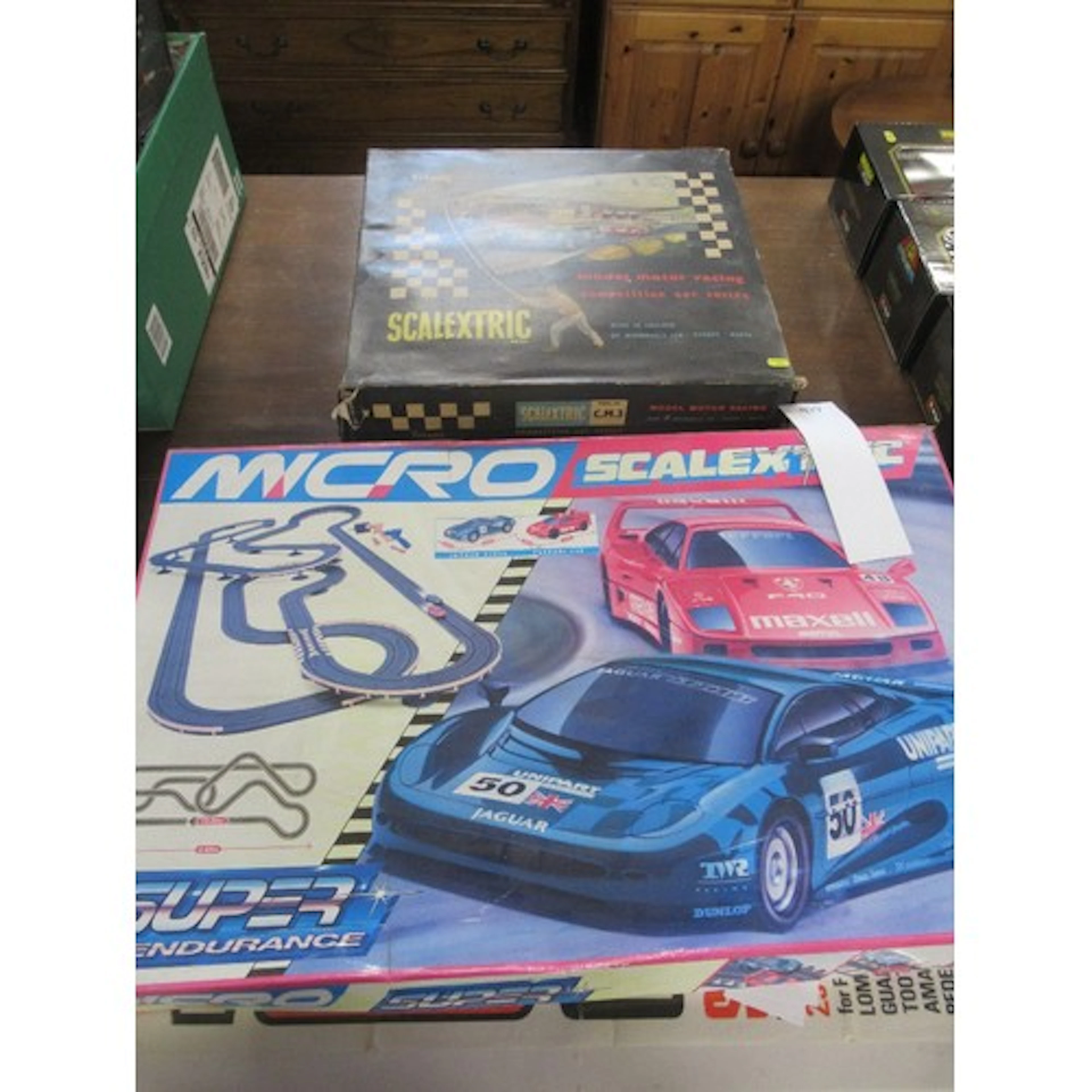 A vintage Triang Scalextric set together with a Hornby Scale...