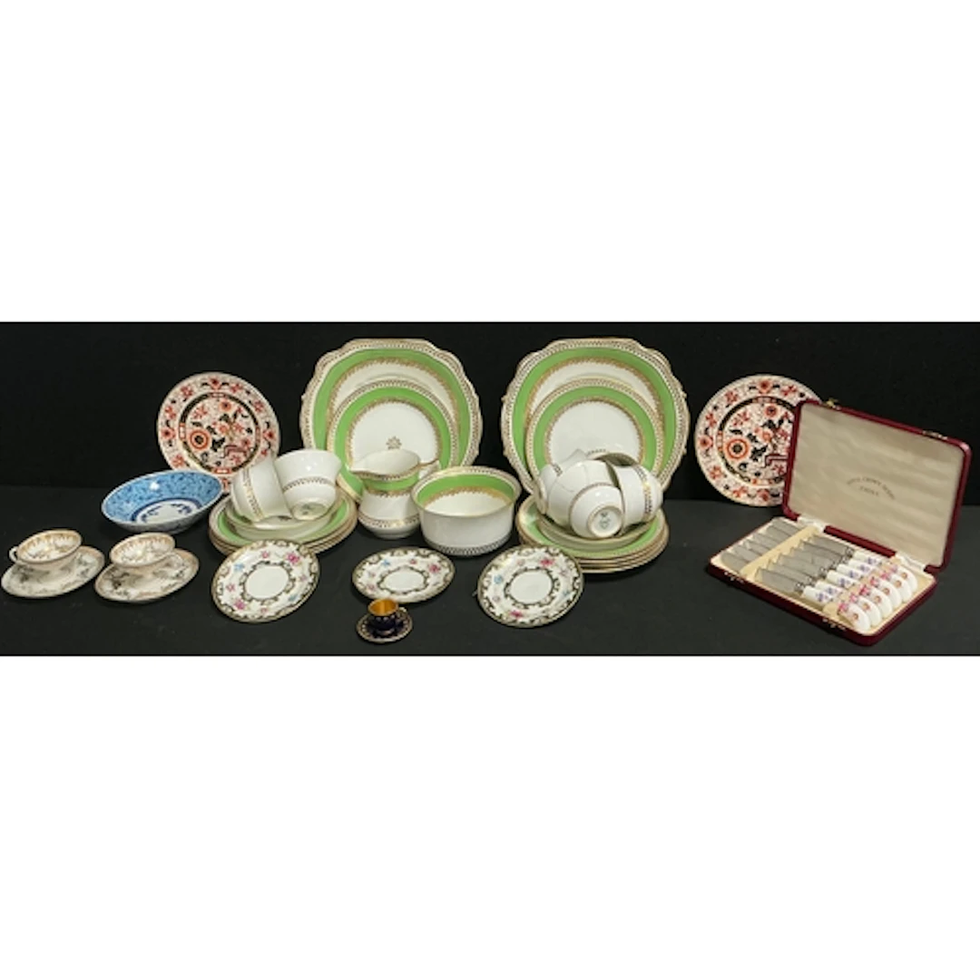 A diamond part tea service for to include six tea cups, ten ...