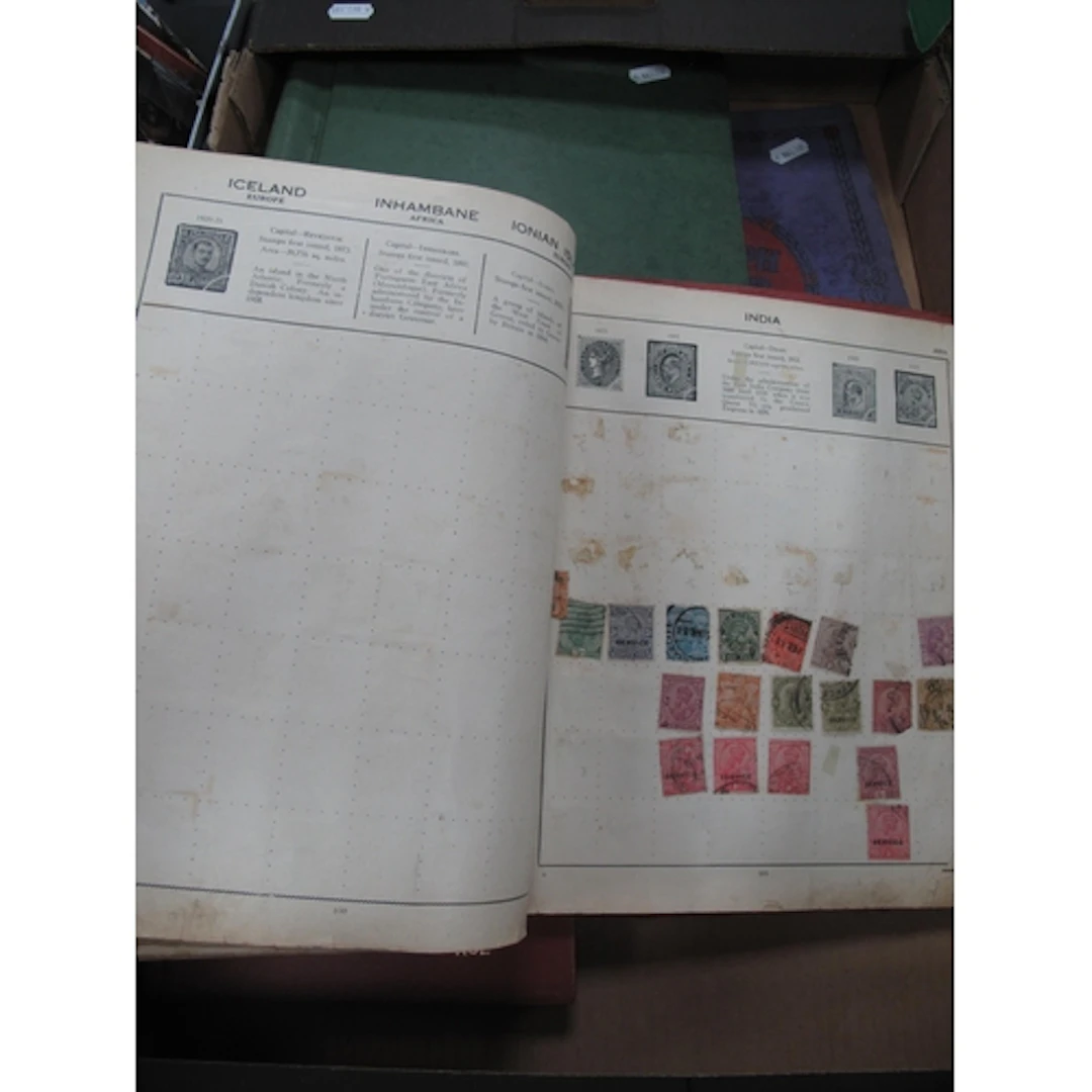 Stamps; A collection of World stamps, housed in two 'Triumph...