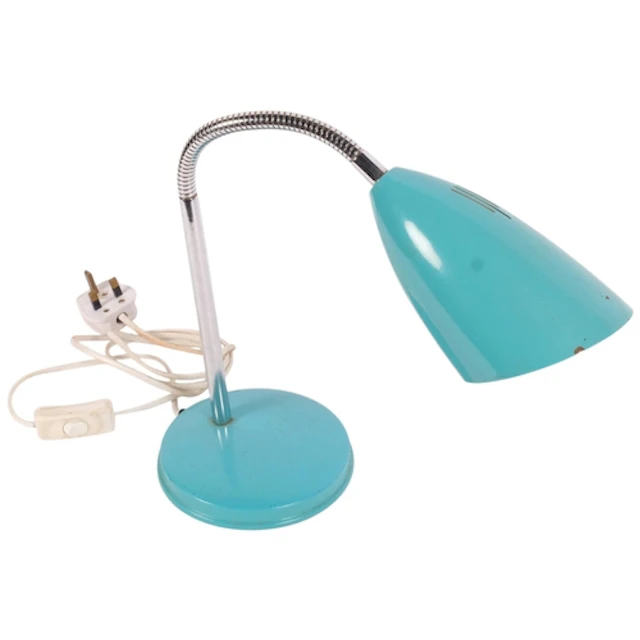 A small turquoise coloured desk lamp, with articulated colum...