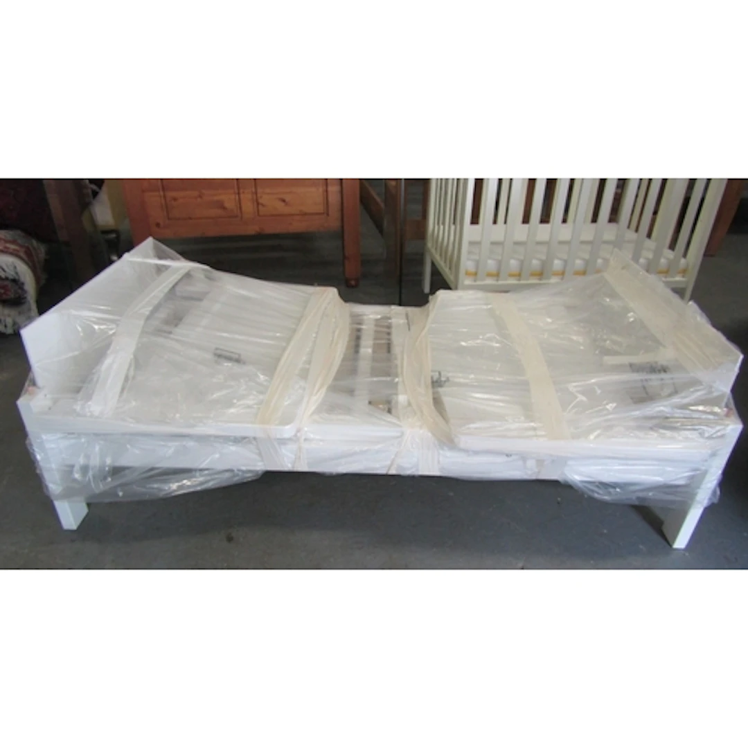 Modern Single Bed Contained Within Protective Covering Sound...
