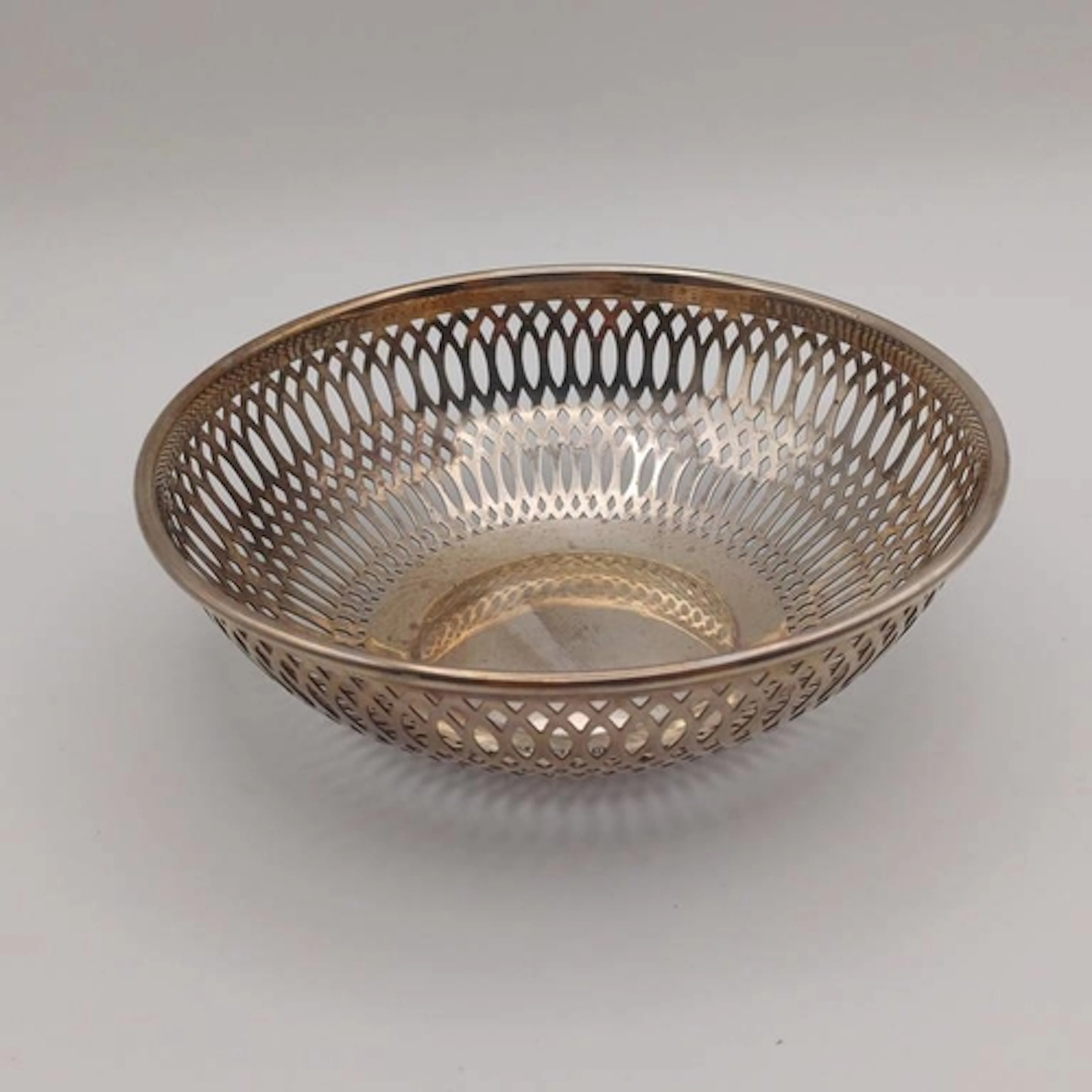 A SILVER BOWL WITH PIERCED DECORATION BY JOHN BATT & CO LTD,...