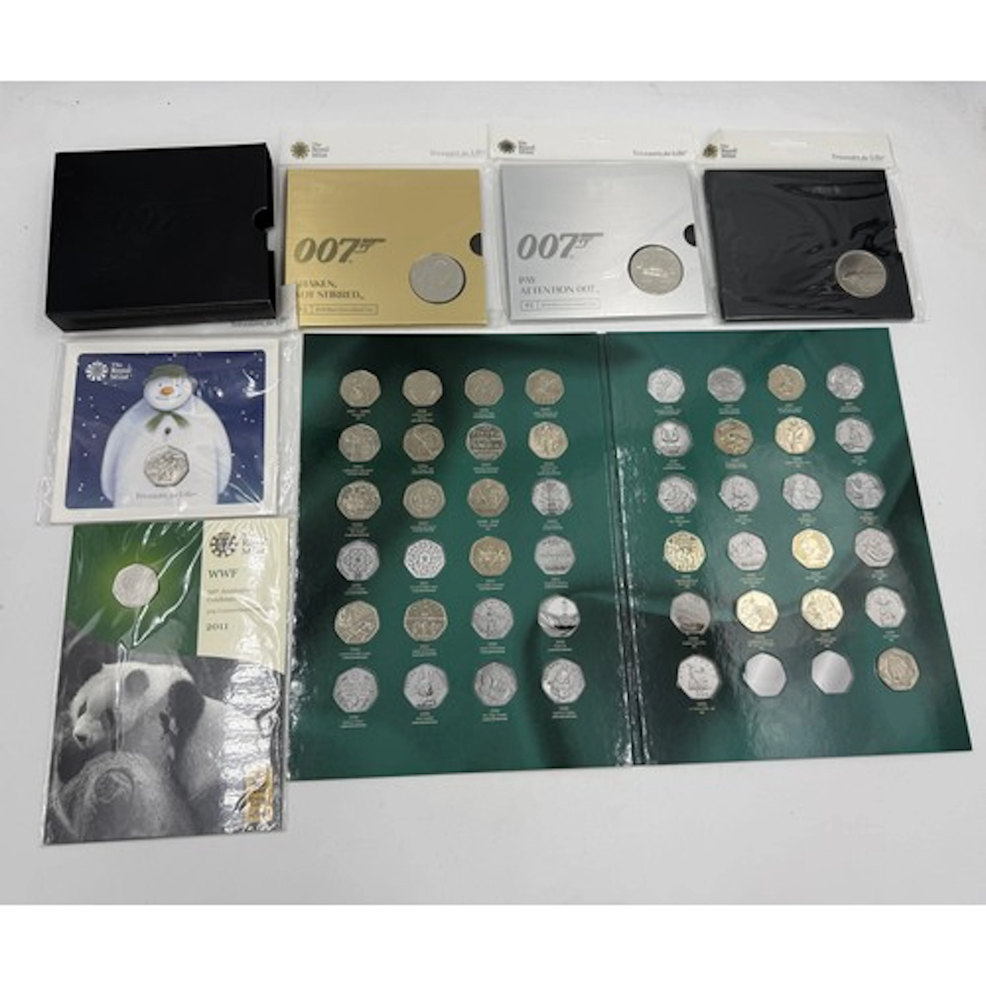 Royal Mint 007 to include Bond, James Bond, Pay Attention 00...