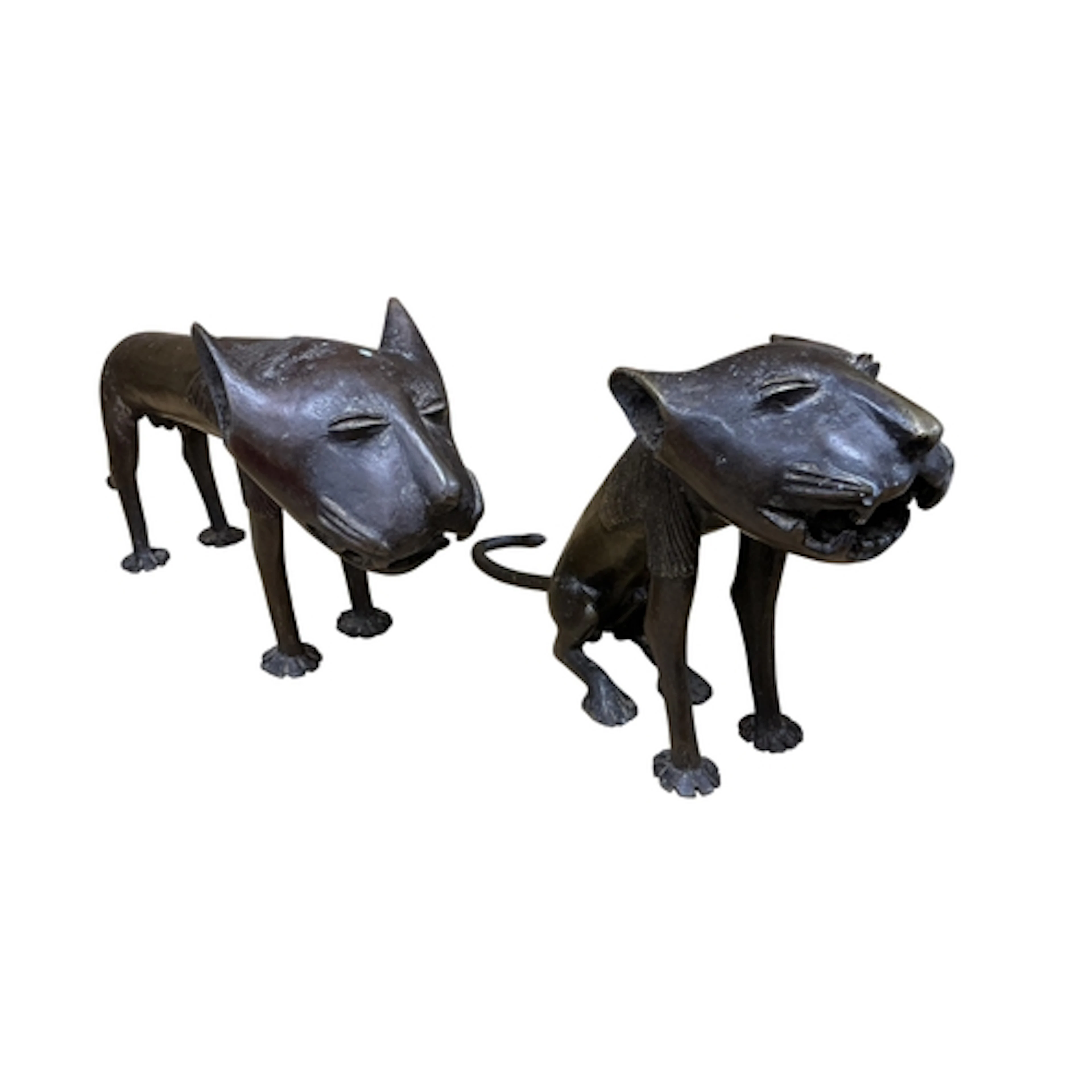 Two Benin style bronze lions, larger 20cm.