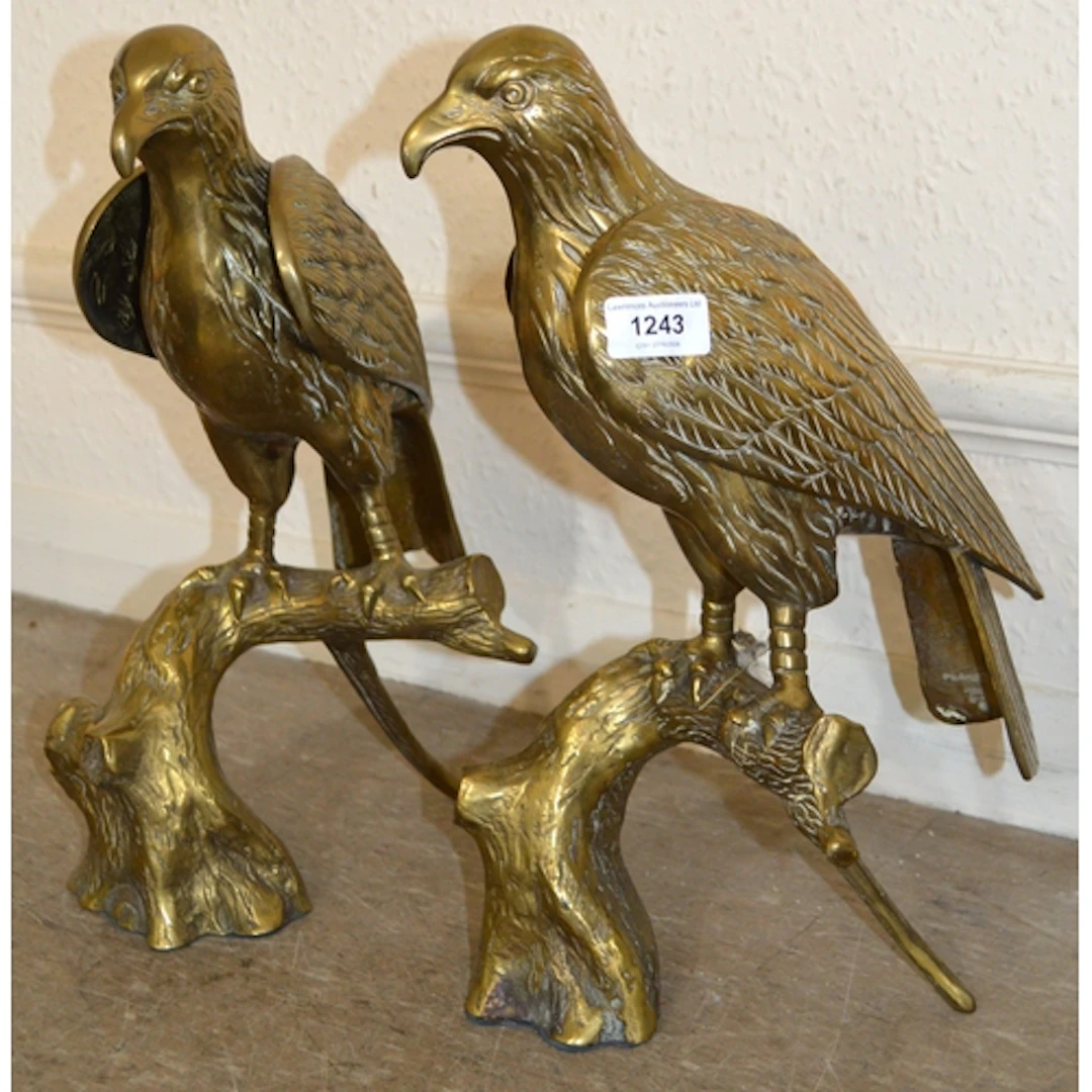 Pair of brass figures, birds of prey, 29cm high