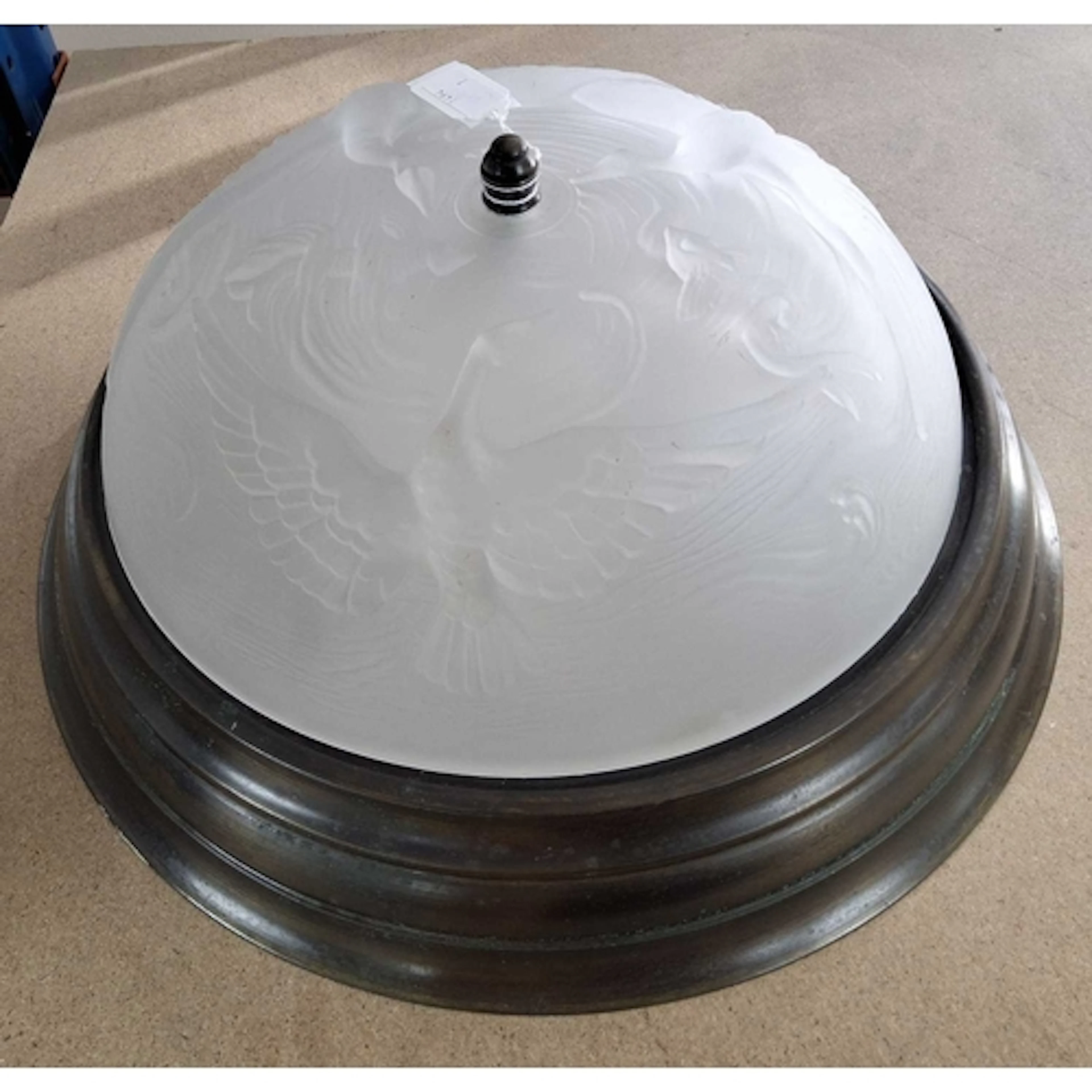 AN ART DECO CEILING LIGHT, in the style of Verlys, the trans...