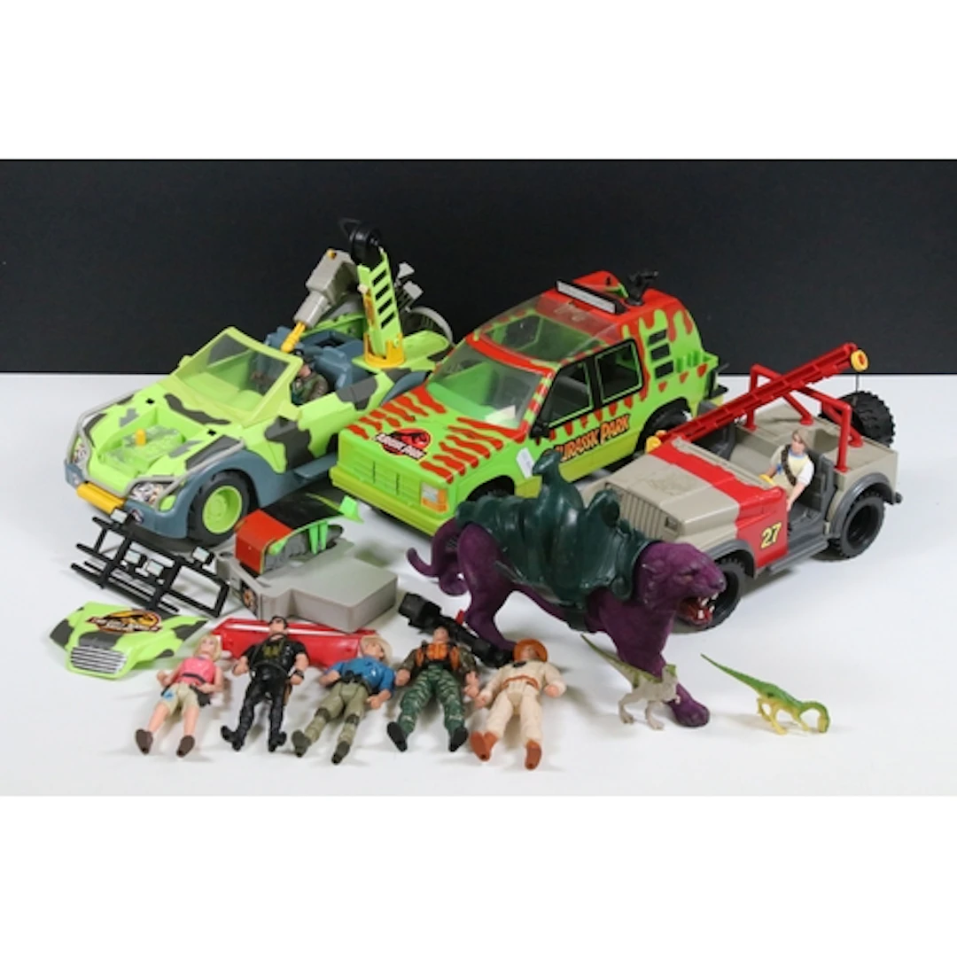 Collection of Hasbro Jurassic Park items including various v...