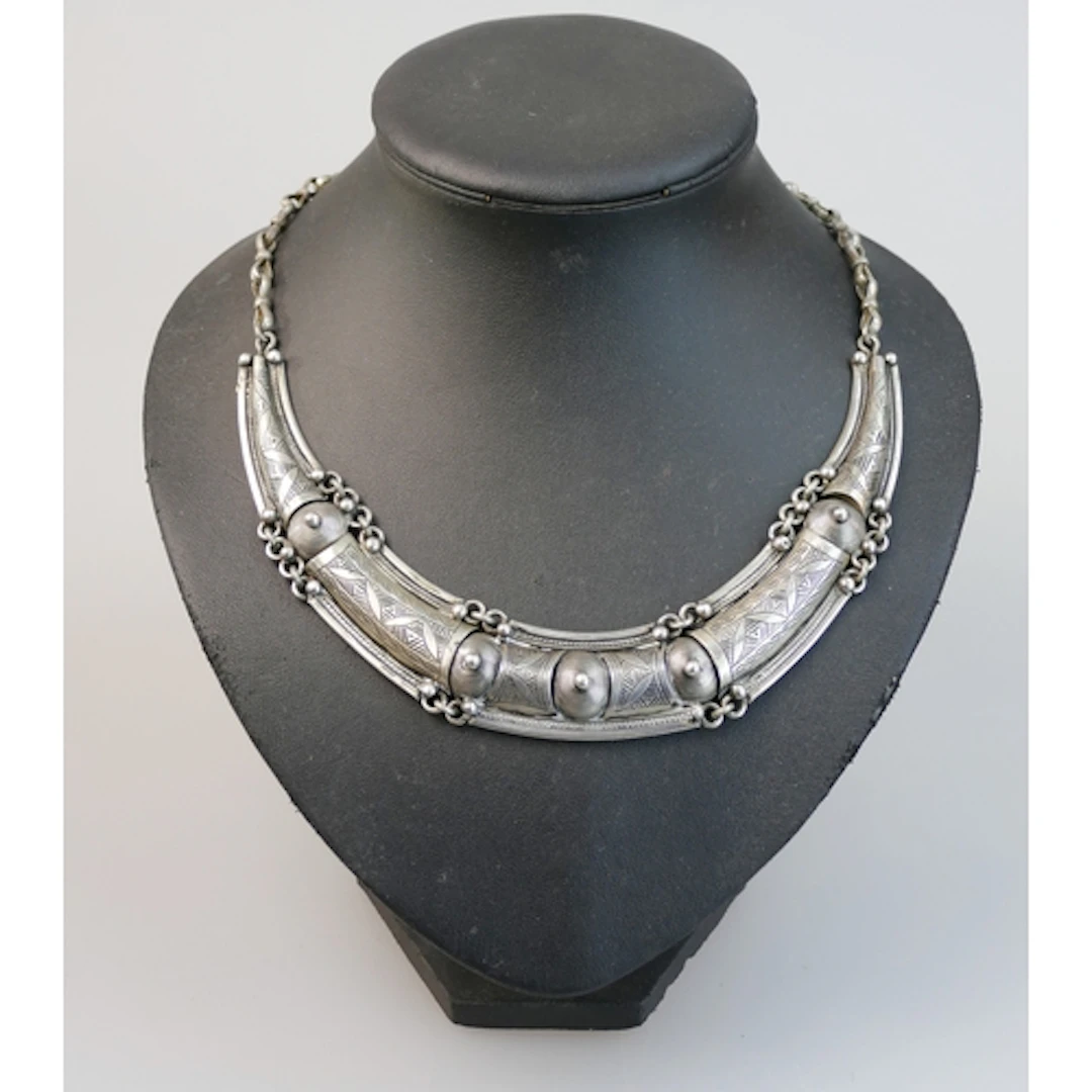 A North African white metal necklace, 76.1g