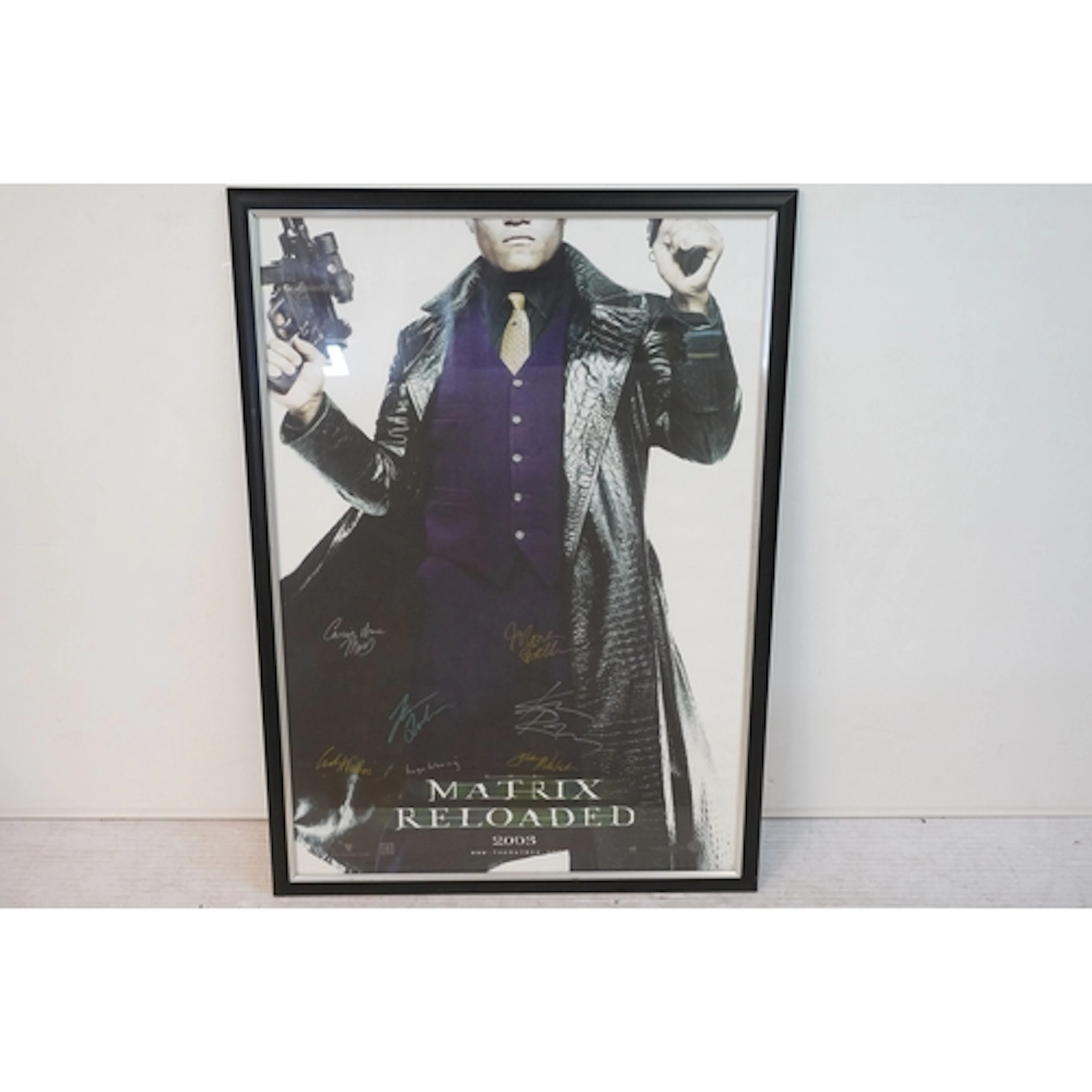 The Matrix Reloaded 2003 film poster complete with seven cas...
