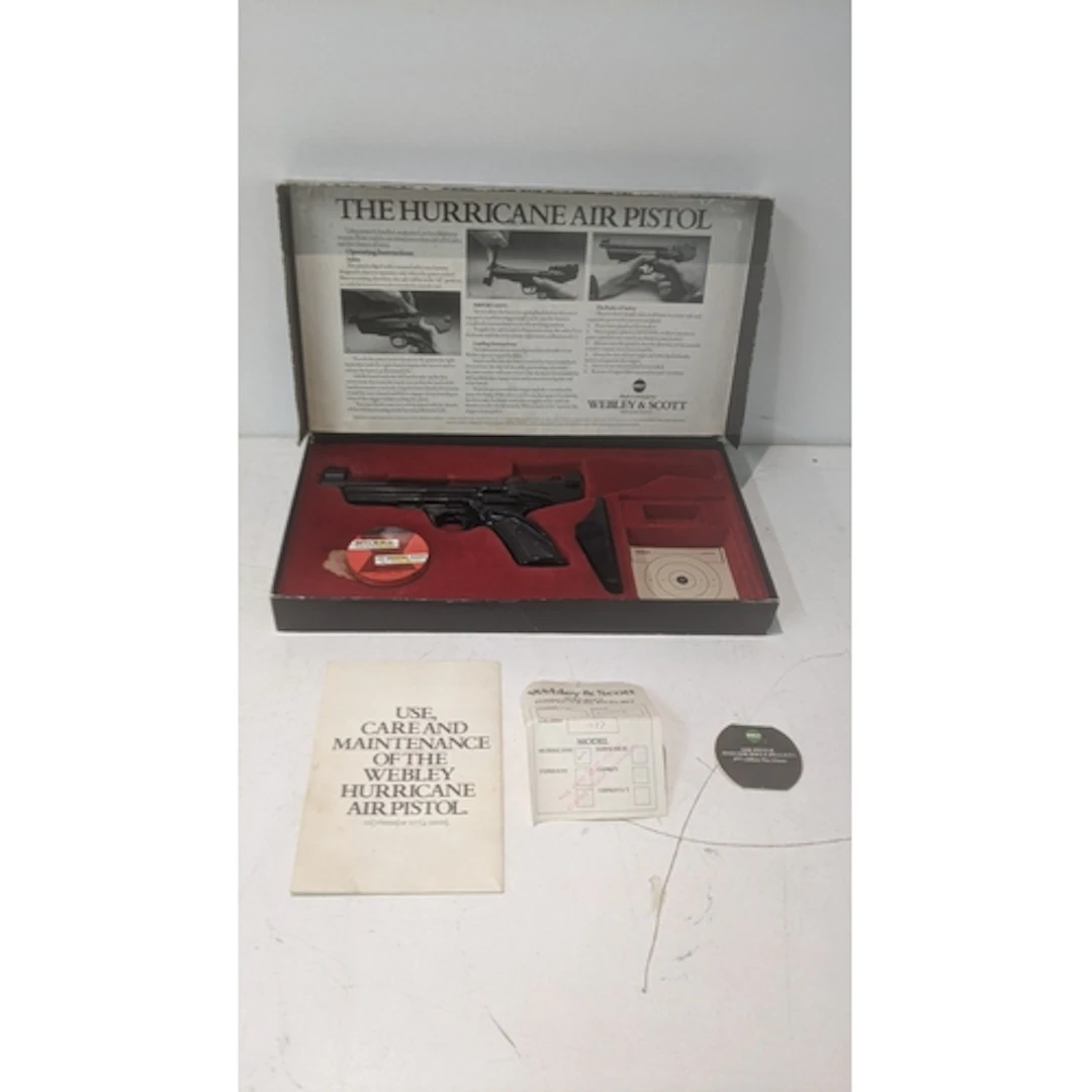 A boxed Webley and Scott Hurricane 177 air pistol and access...