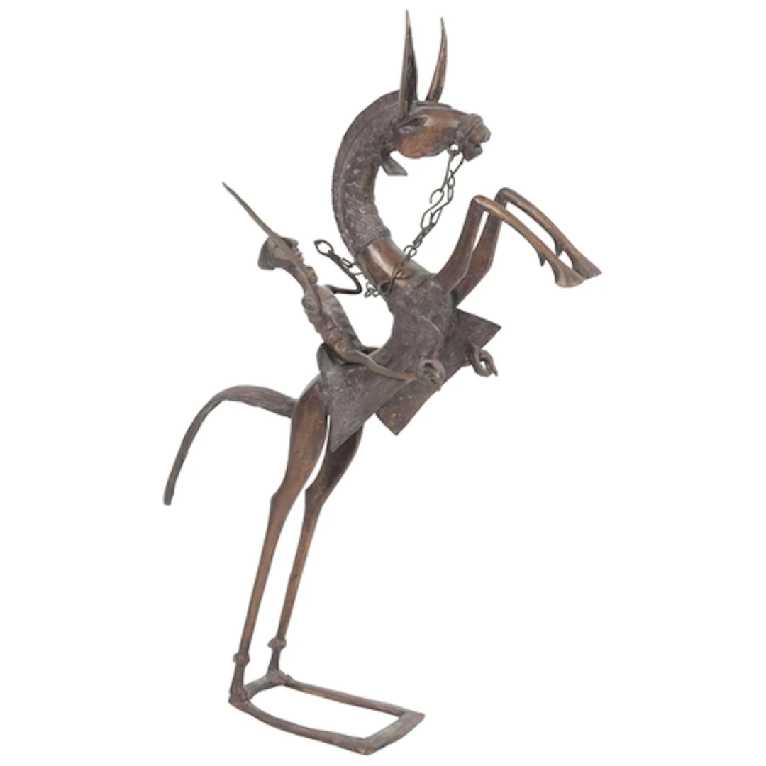 A Bamum bronze model of a rider on a rearing horse, probably...