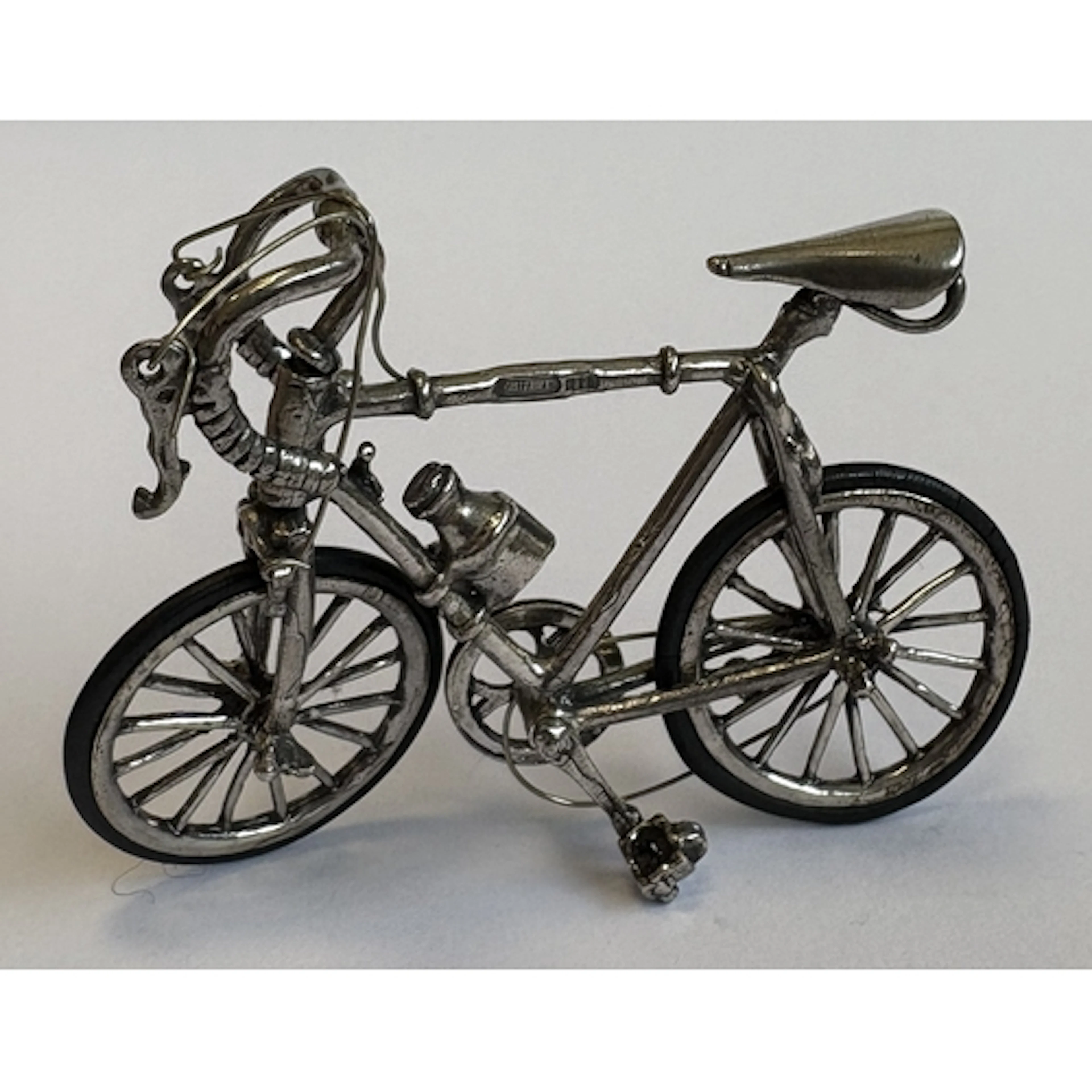 A Continental silver model of a bicycle. Approx. 20 grams. E...