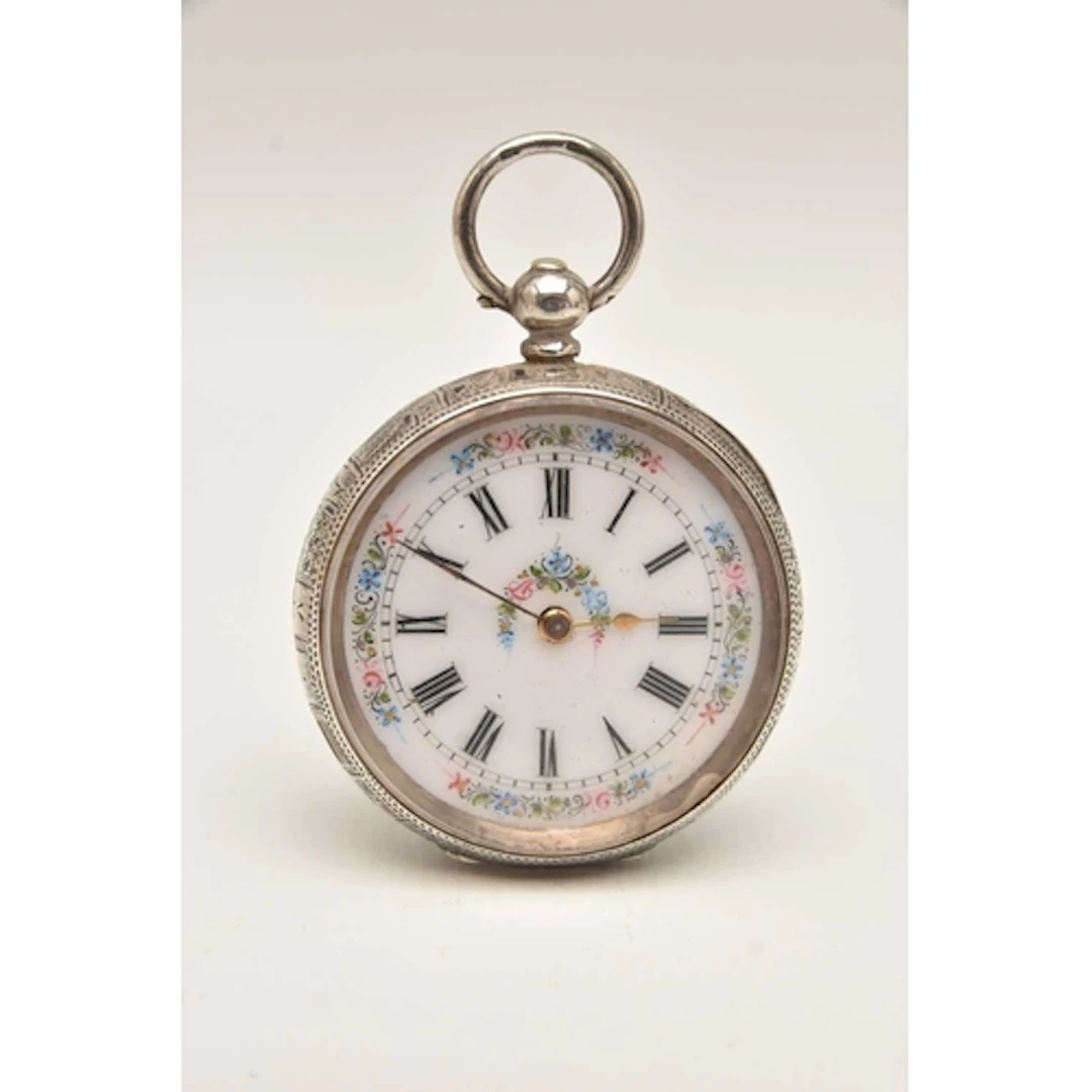 A LADIES CASED WHITE METAL, OPEN FACE POCKET WATCH, key woun...