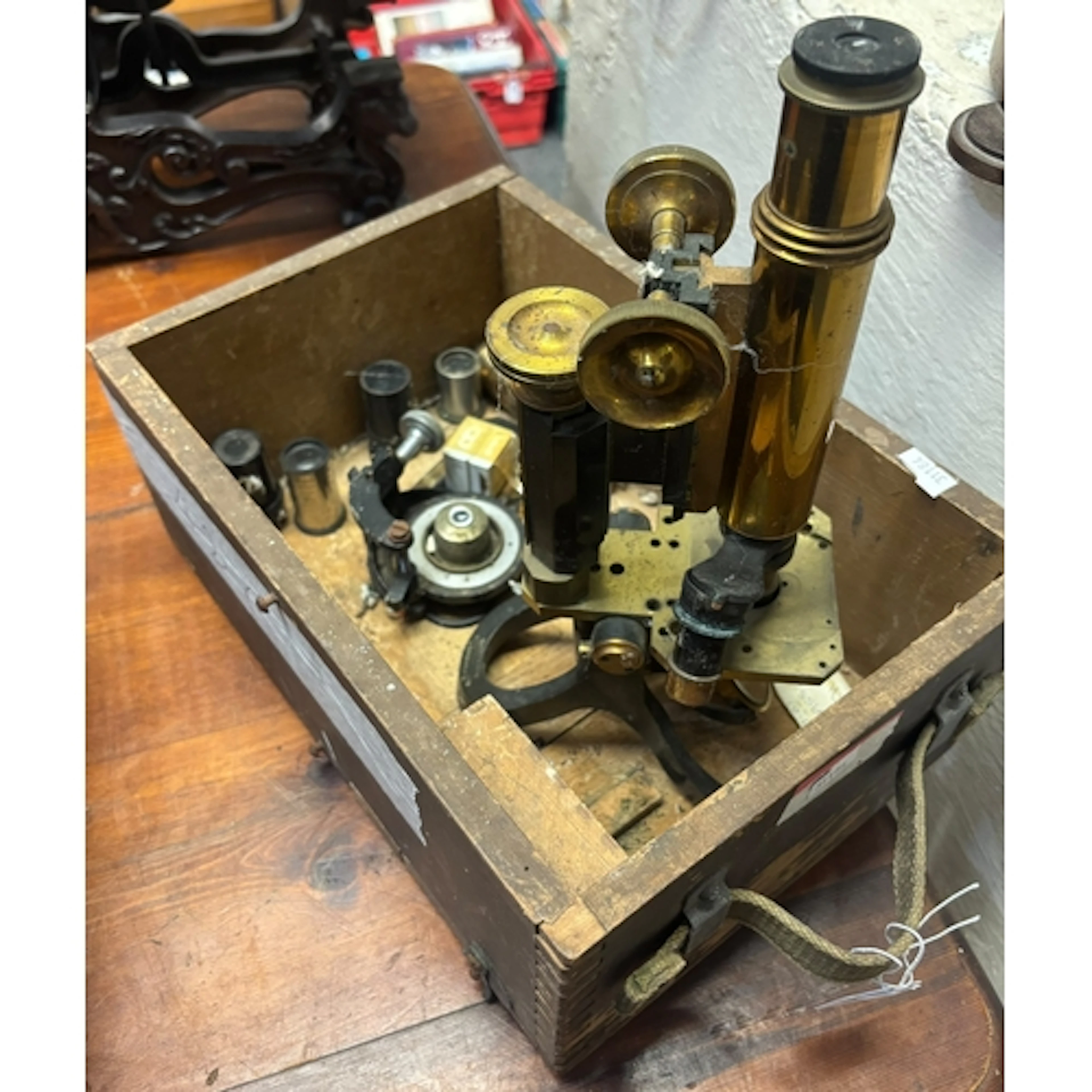 Vintage 'Utility' microscope with accessories in partly fitt...