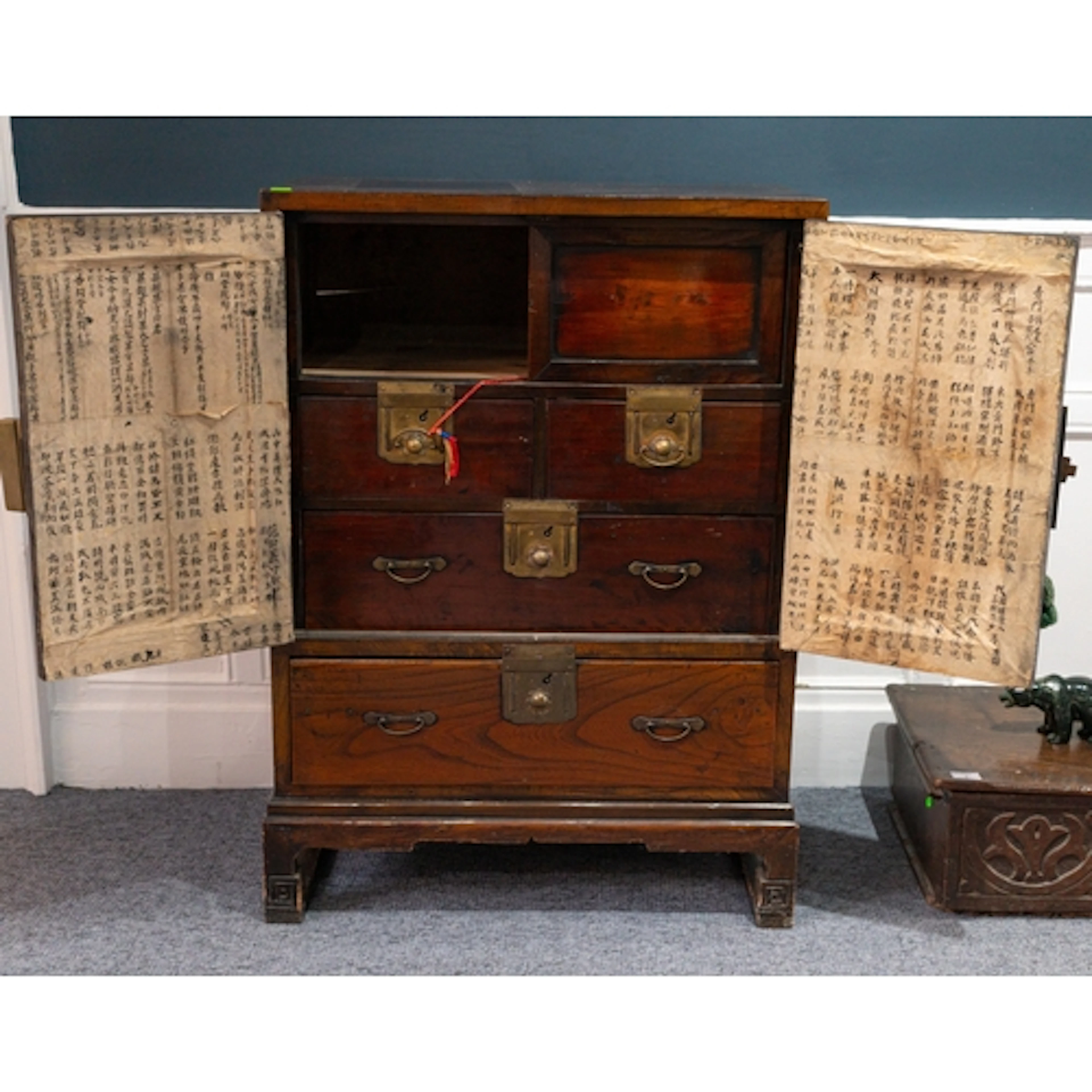 A Korean hardwood wedding chest, 19th century, with metal fi...