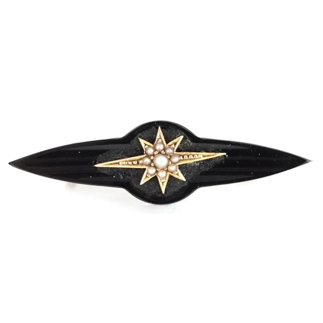 Victorian French jet unmarked gold brooch set with seed pear...