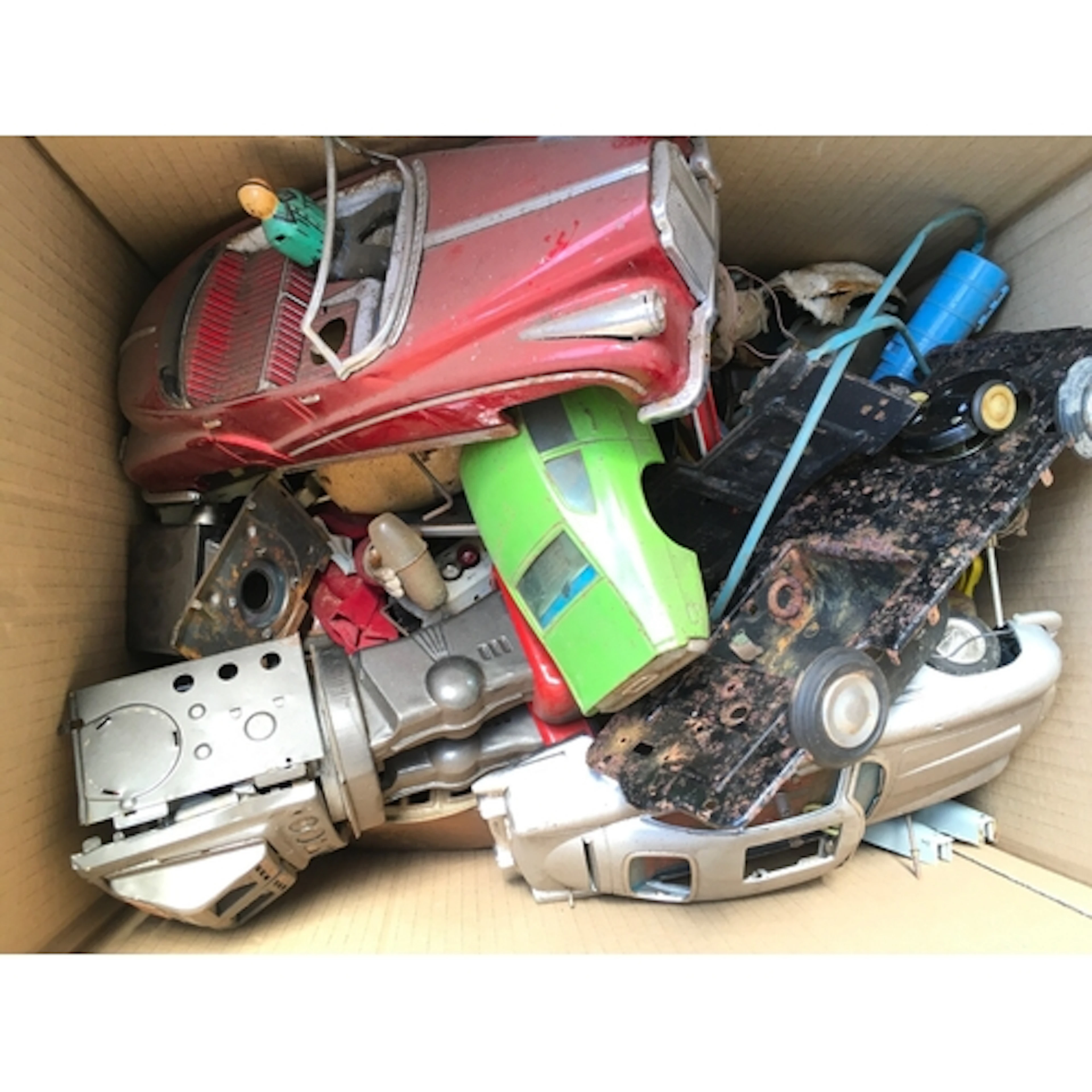 A Box Containing Tinplate Toy Spare Parts Etc. Ideal For Sp...
