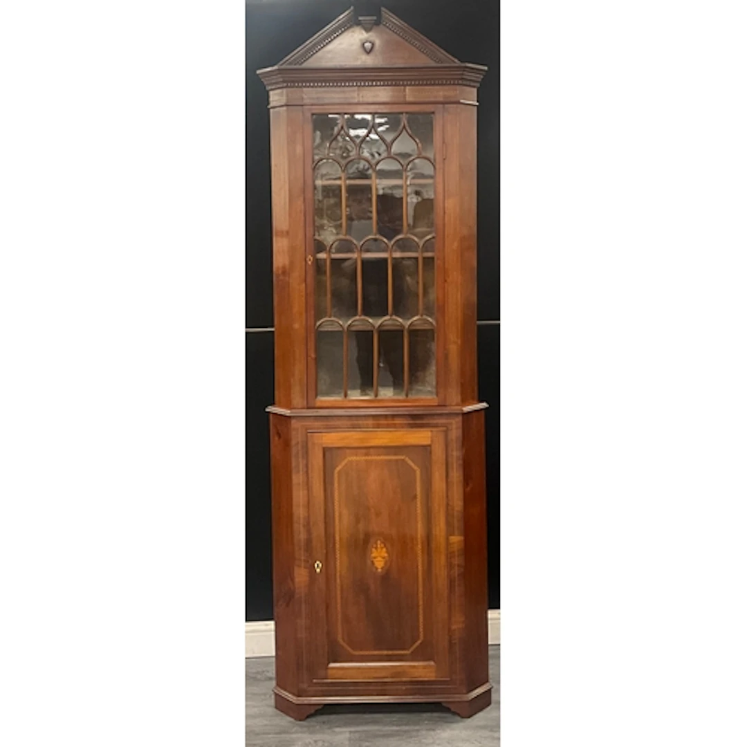 A Sheraton Revival mahogany floor-standing corner display ca...