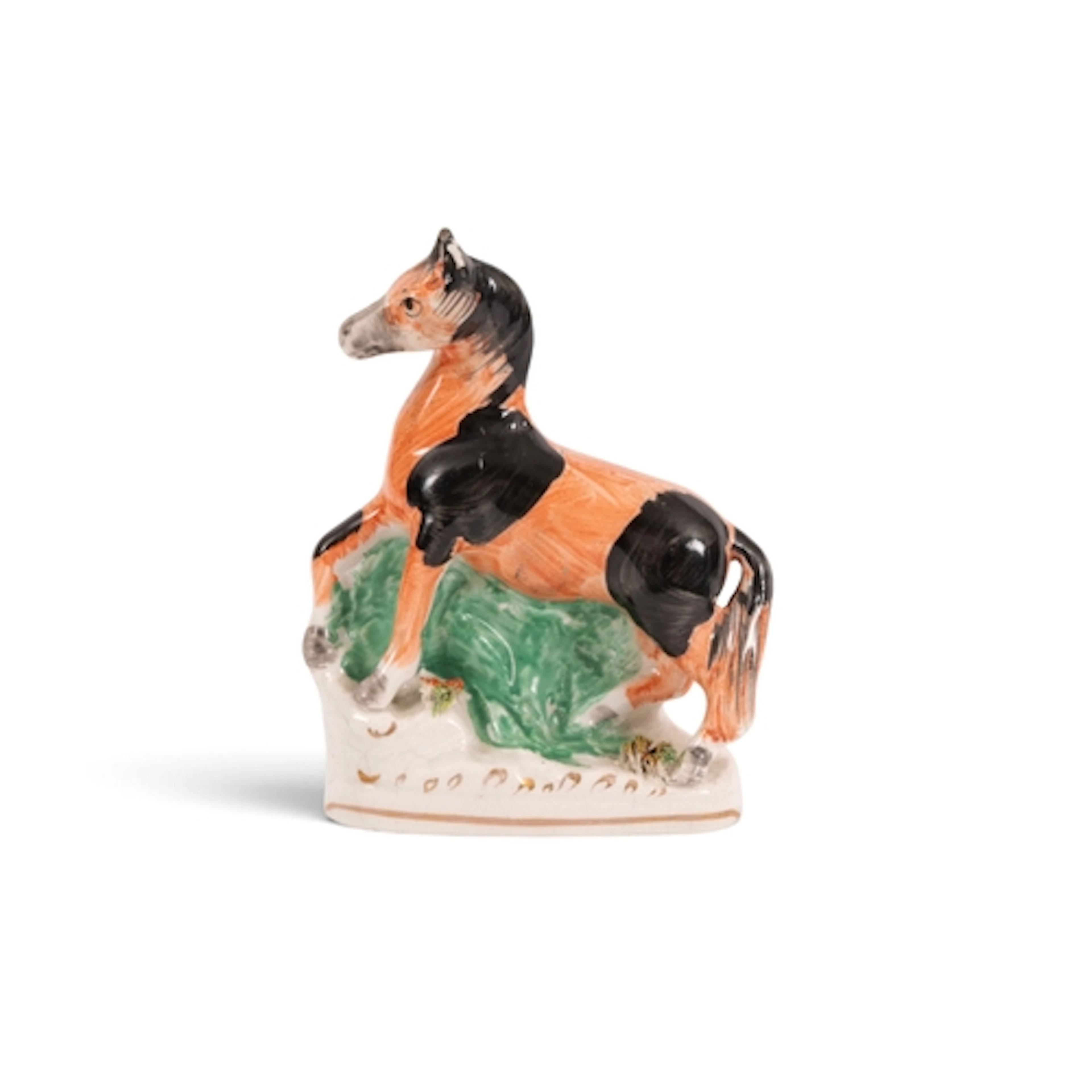 A Staffordshire figure of a horse, 19th century, modelled wi...