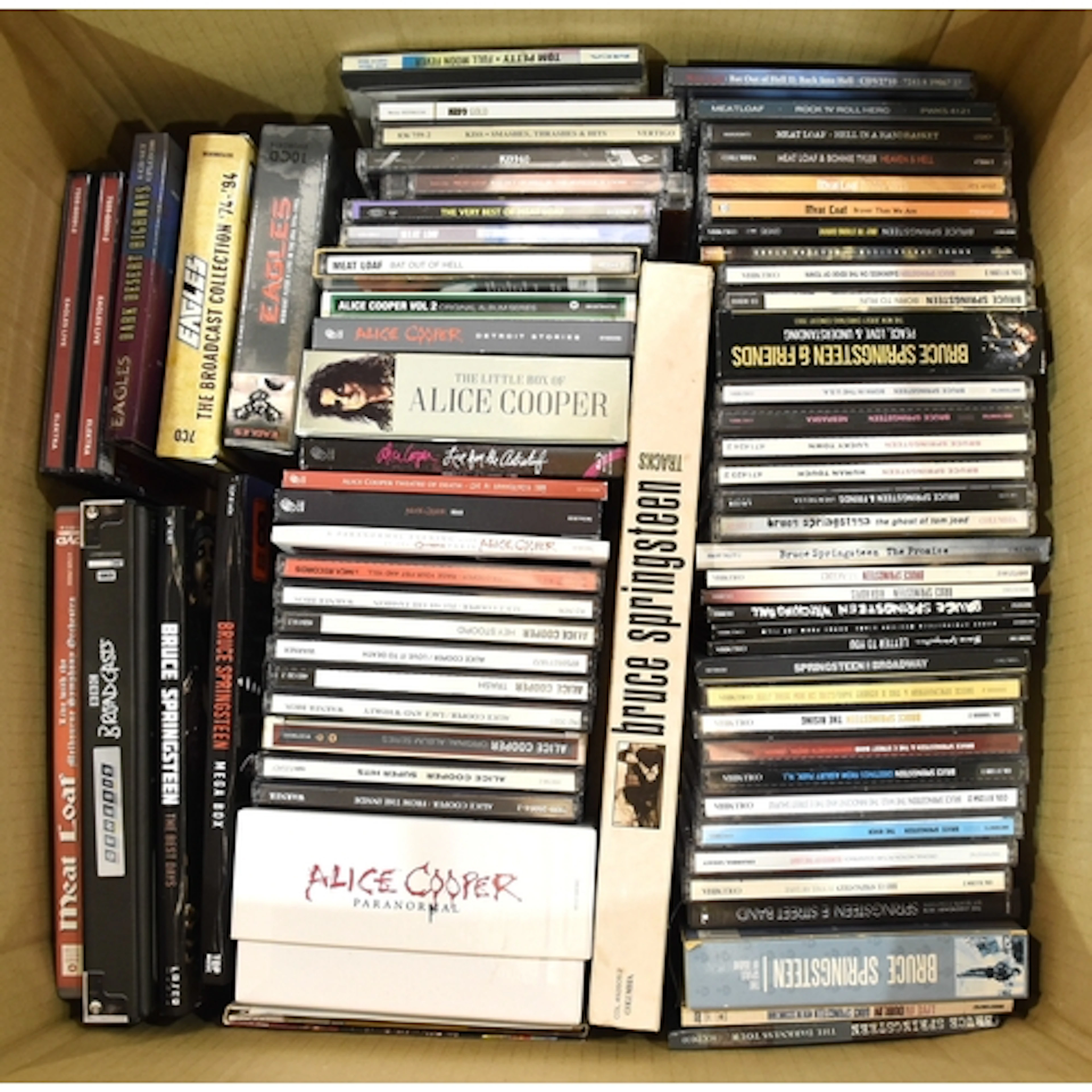 A collection of approximately seventy-five CD's and bo...