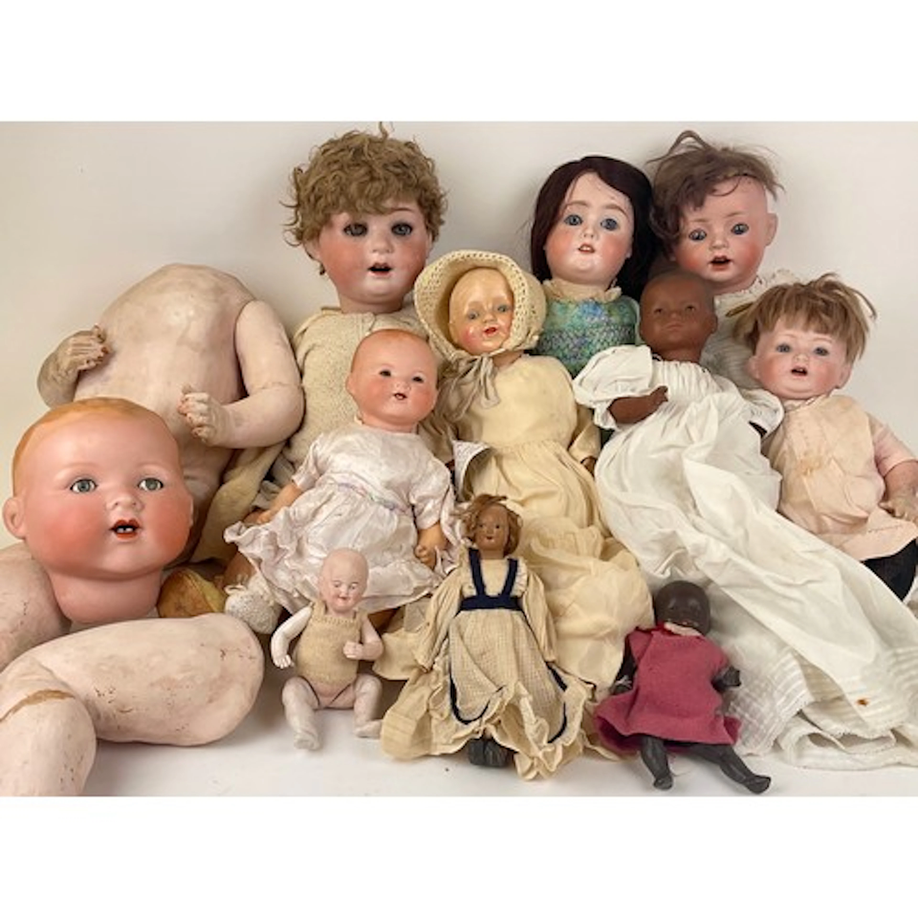 Dolls - A large early 20th century German bisque headed doll...