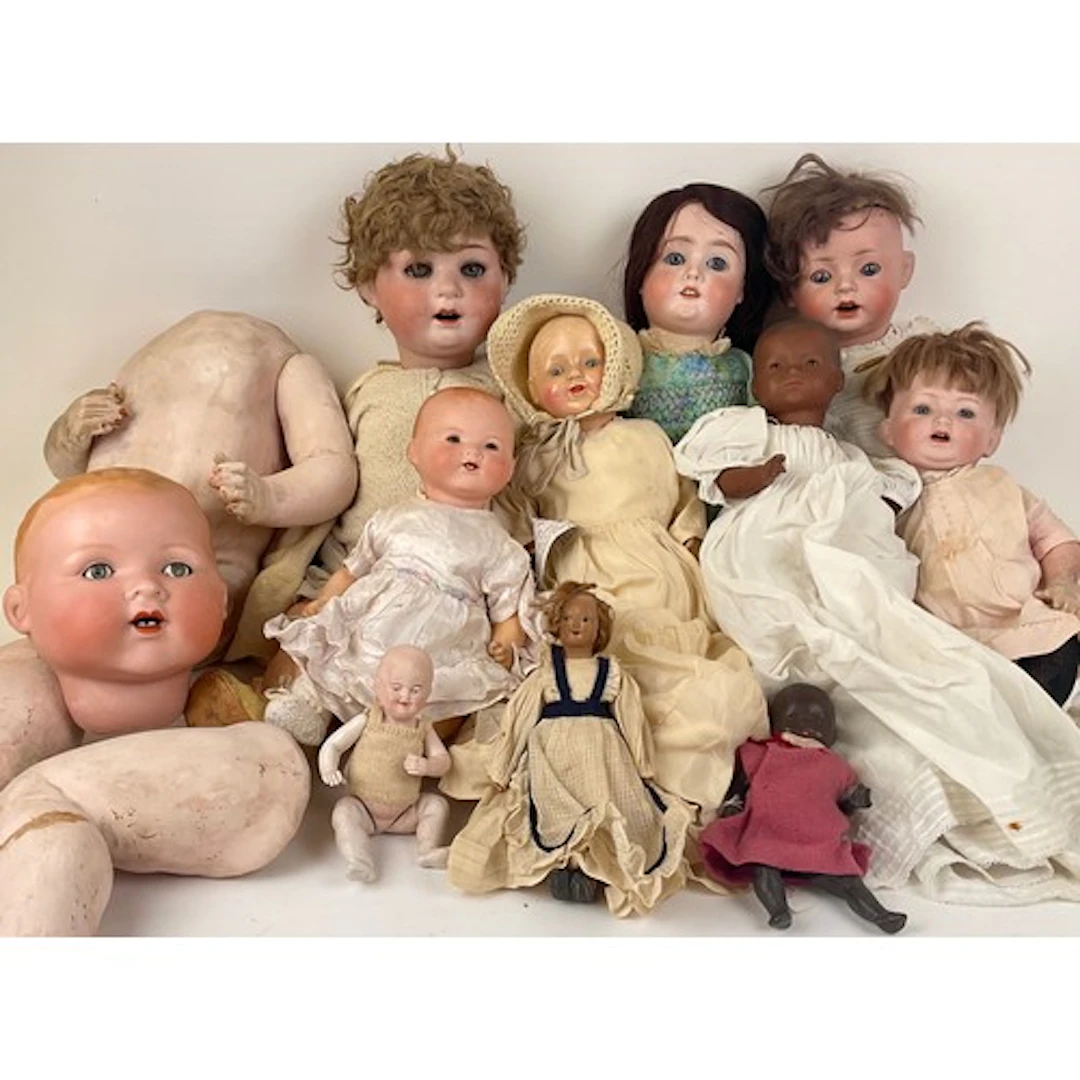 Dolls - A large early 20th century German bisque headed doll...