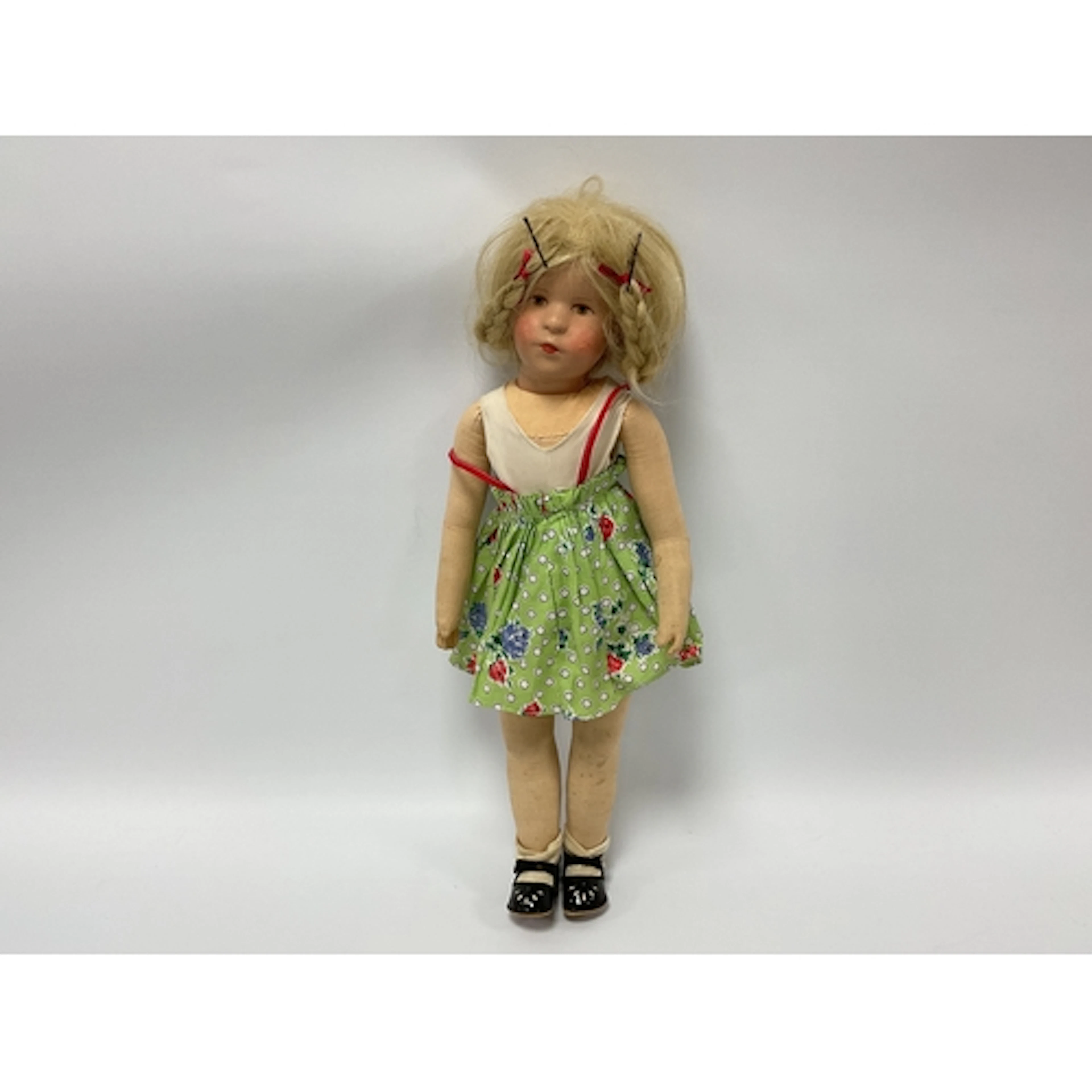 A Kathe Kruse Doll, with painted hard plastic swivel head, b...