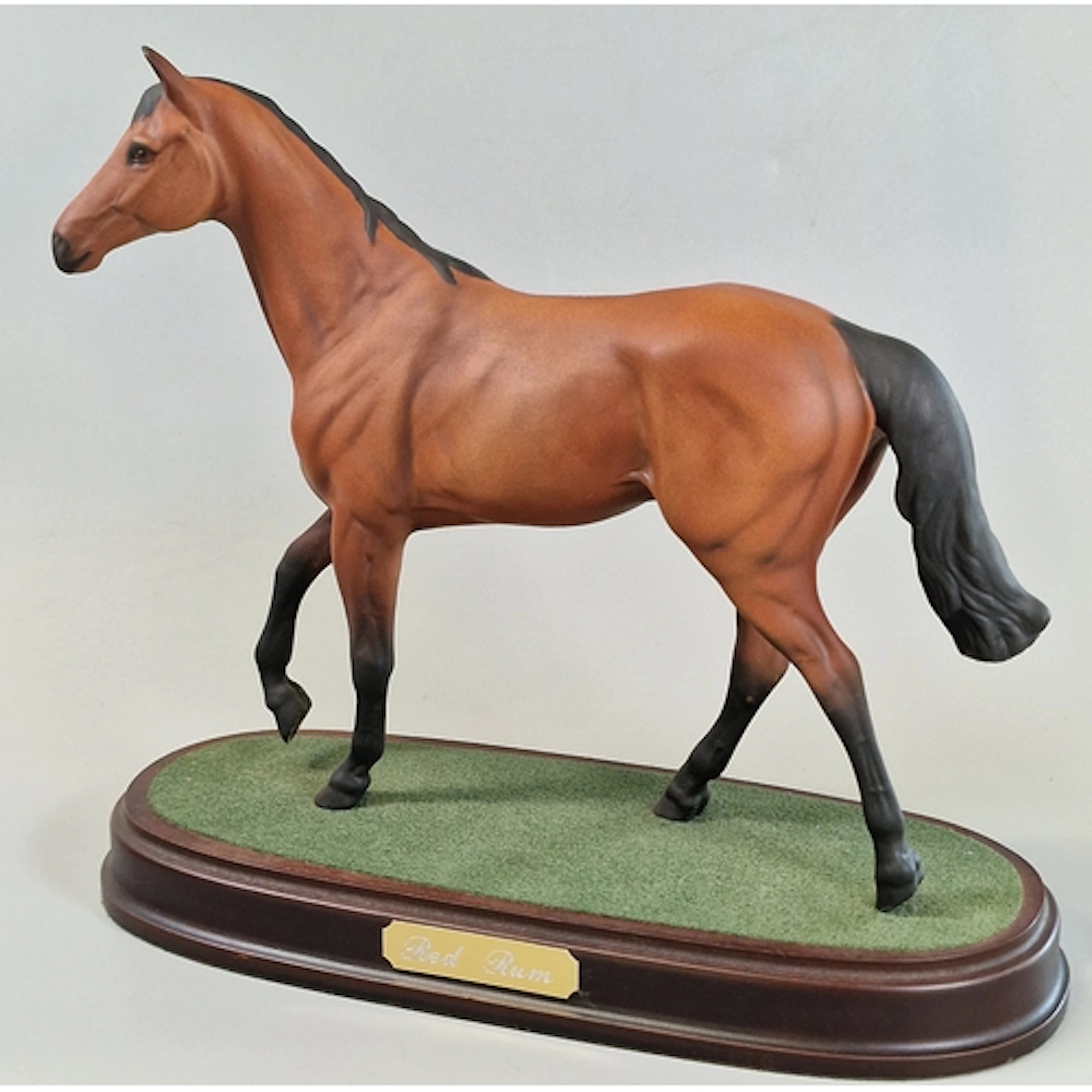 Royal Doulton ceramic horse, 'Red Rum', on base. 23cm high a...