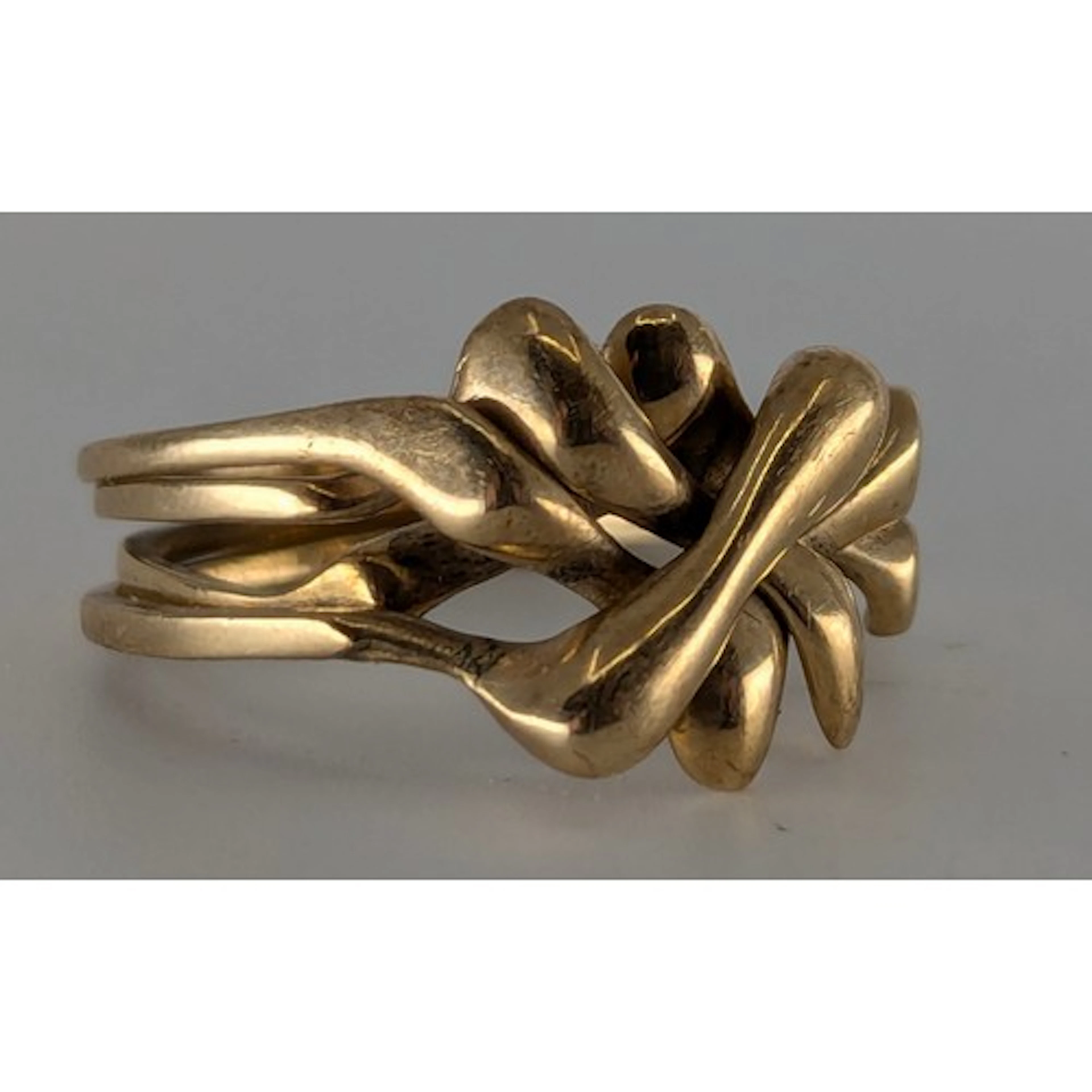 A 9ct gold Russian design interlocking puzzle ring, size Y, ...